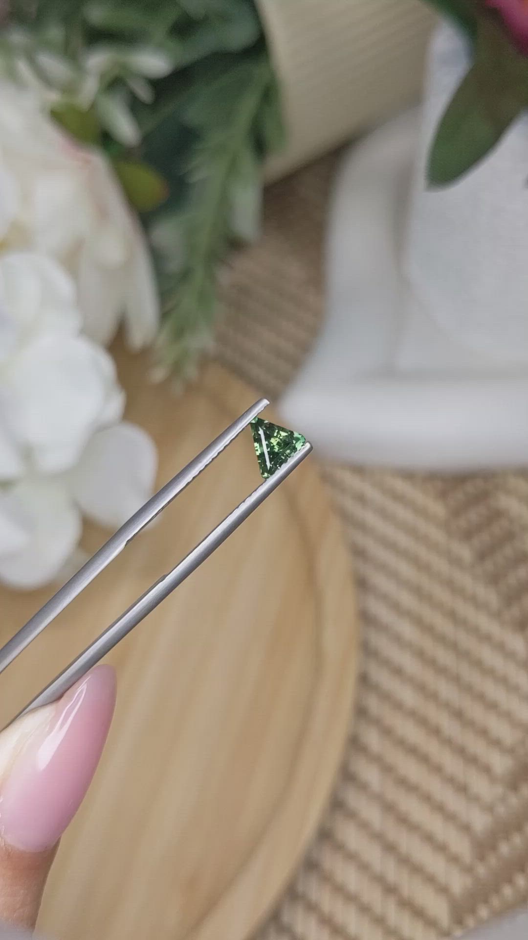 0.69 Ct. Yellowish Green Sapphire from Ceylon (Sri Lanka) Size Video