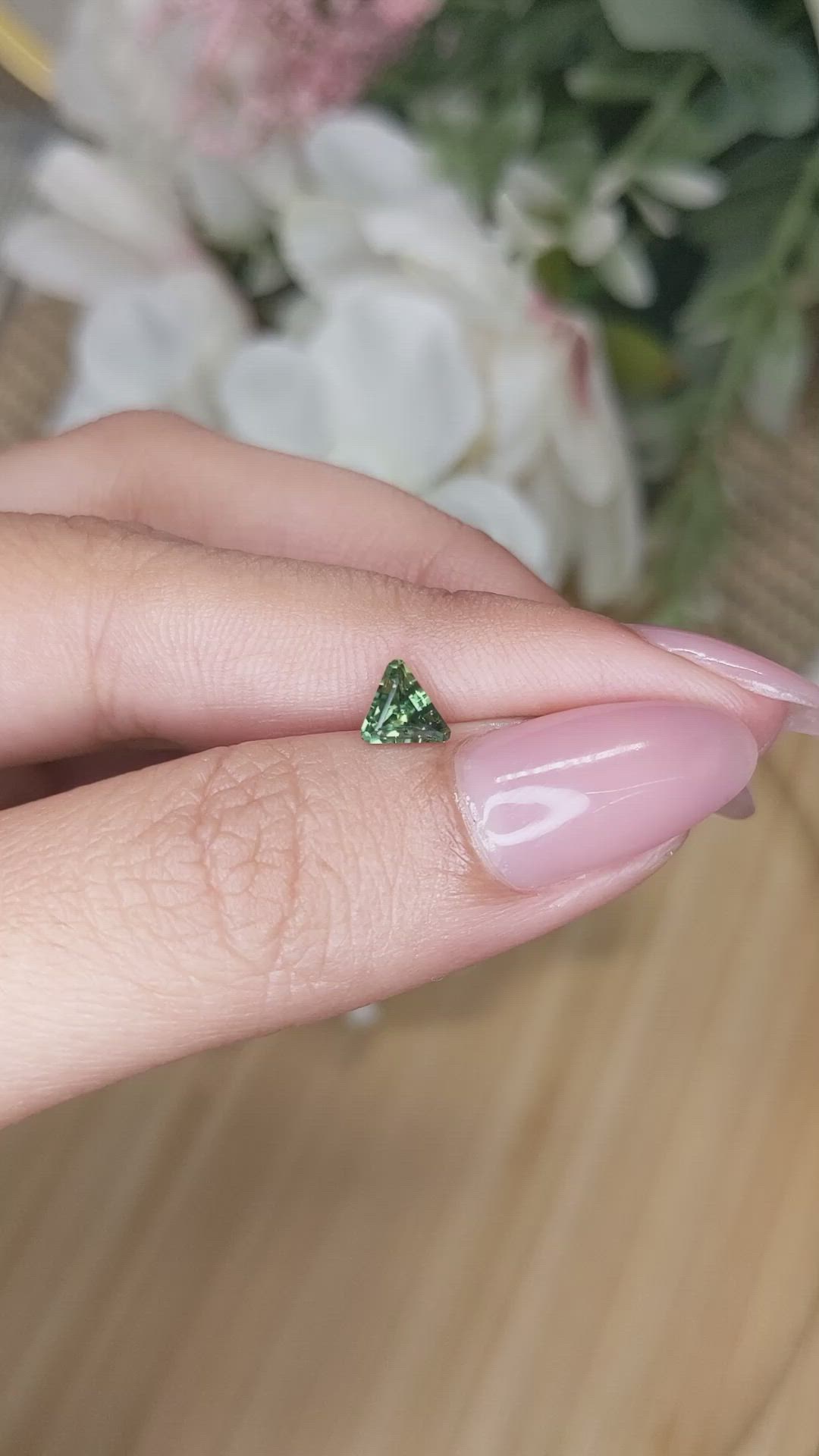 0.69 Ct. Yellowish Green Sapphire from Ceylon (Sri Lanka) Size Video