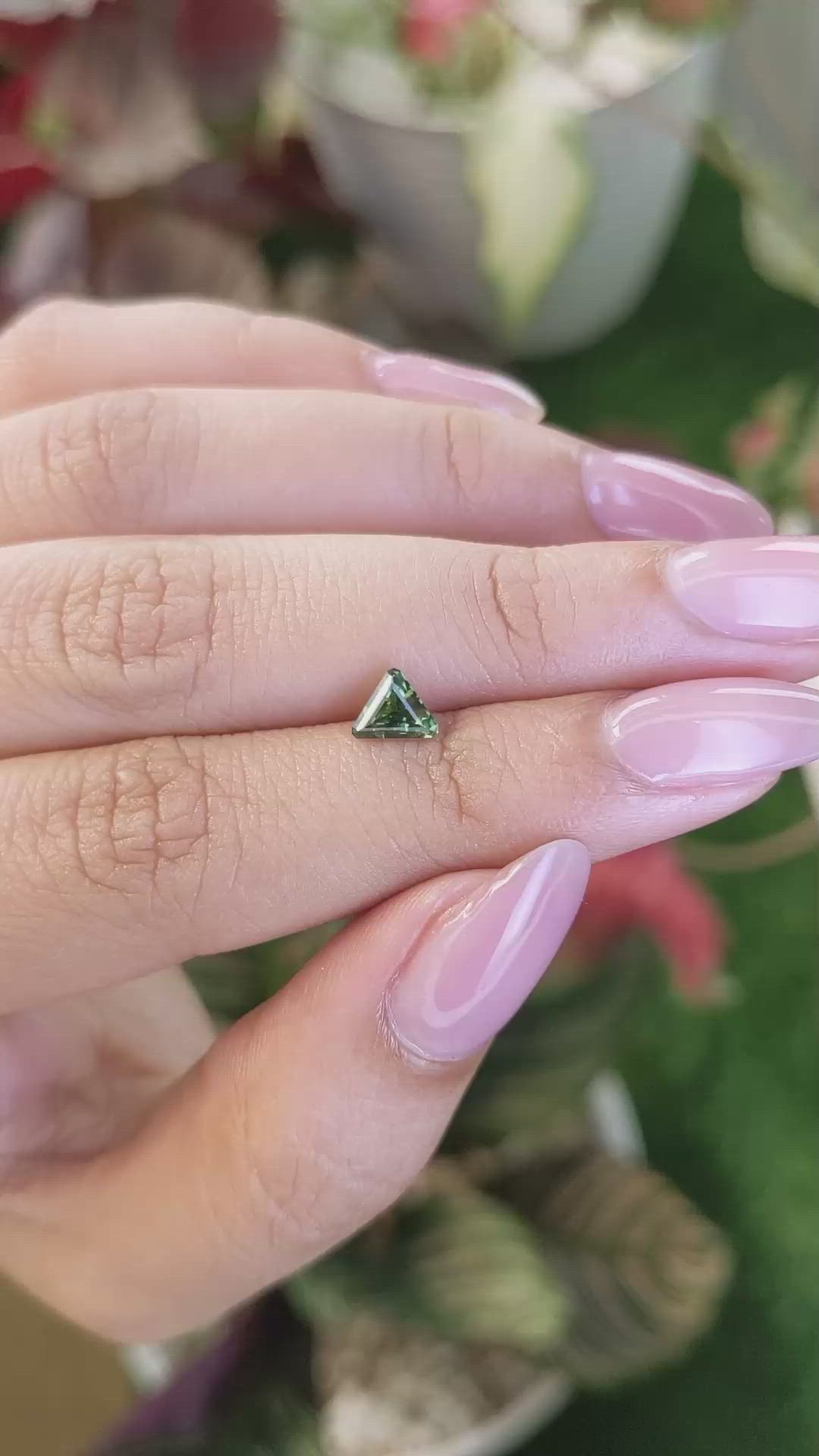 0.69 Ct. Yellowish Green Sapphire from Ceylon (Sri Lanka) Size Video