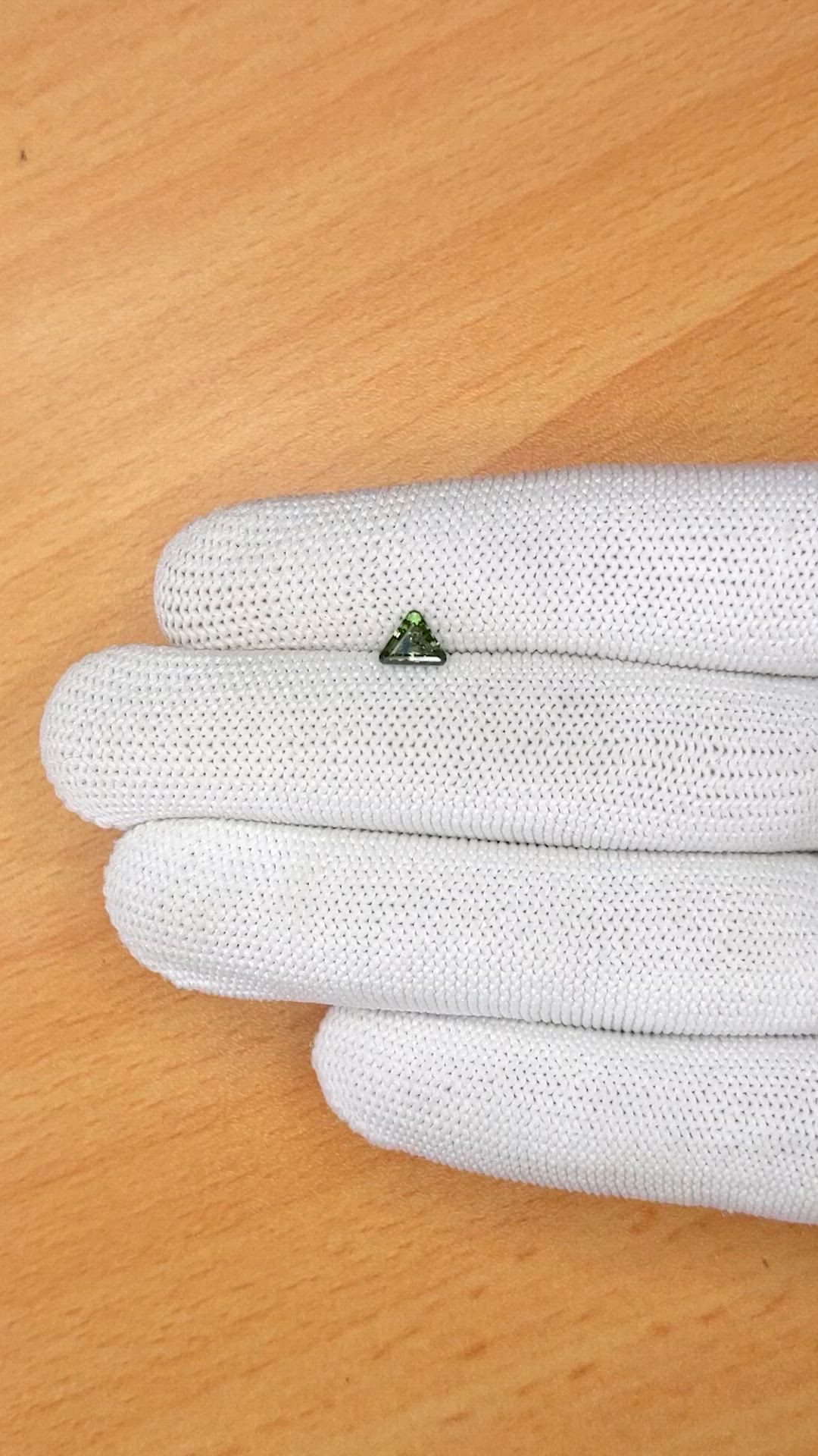0.69 Ct. Yellowish Green Sapphire from Ceylon (Sri Lanka) Size Video