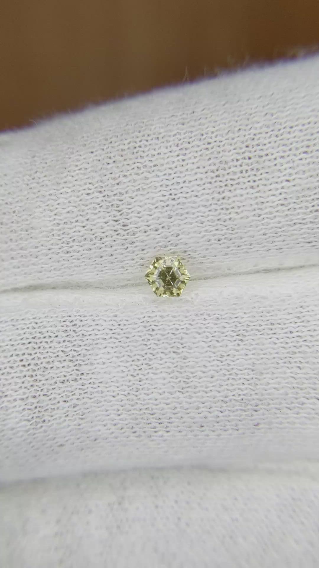 0.29 Ct. Peach Sapphire from Ceylon (Sri Lanka) Size Video