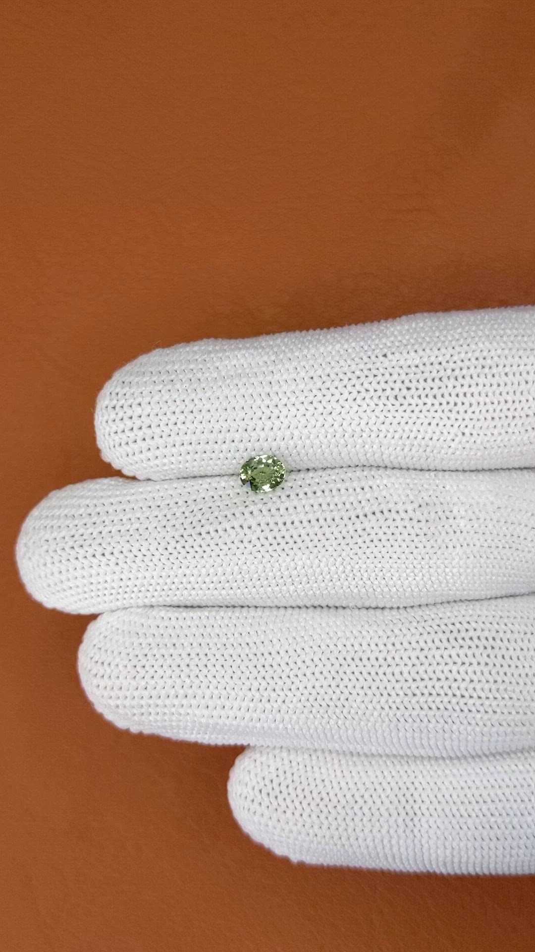 0.55 Ct. Yellowish Green Sapphire from Ceylon (Sri Lanka) Size Video