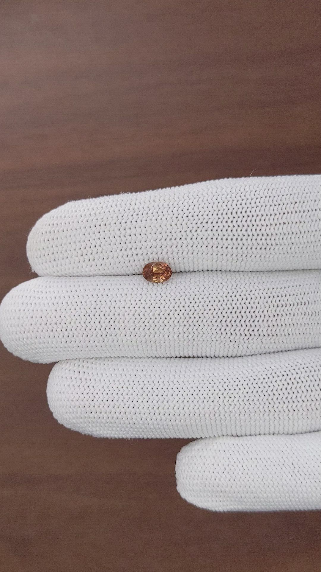 0.64 Ct. Orangish Brown Sapphire from Africa Size Video