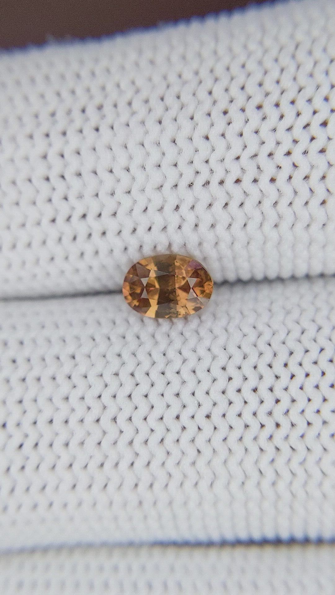 0.64 Ct. Orangish Brown Sapphire from Africa Size Video