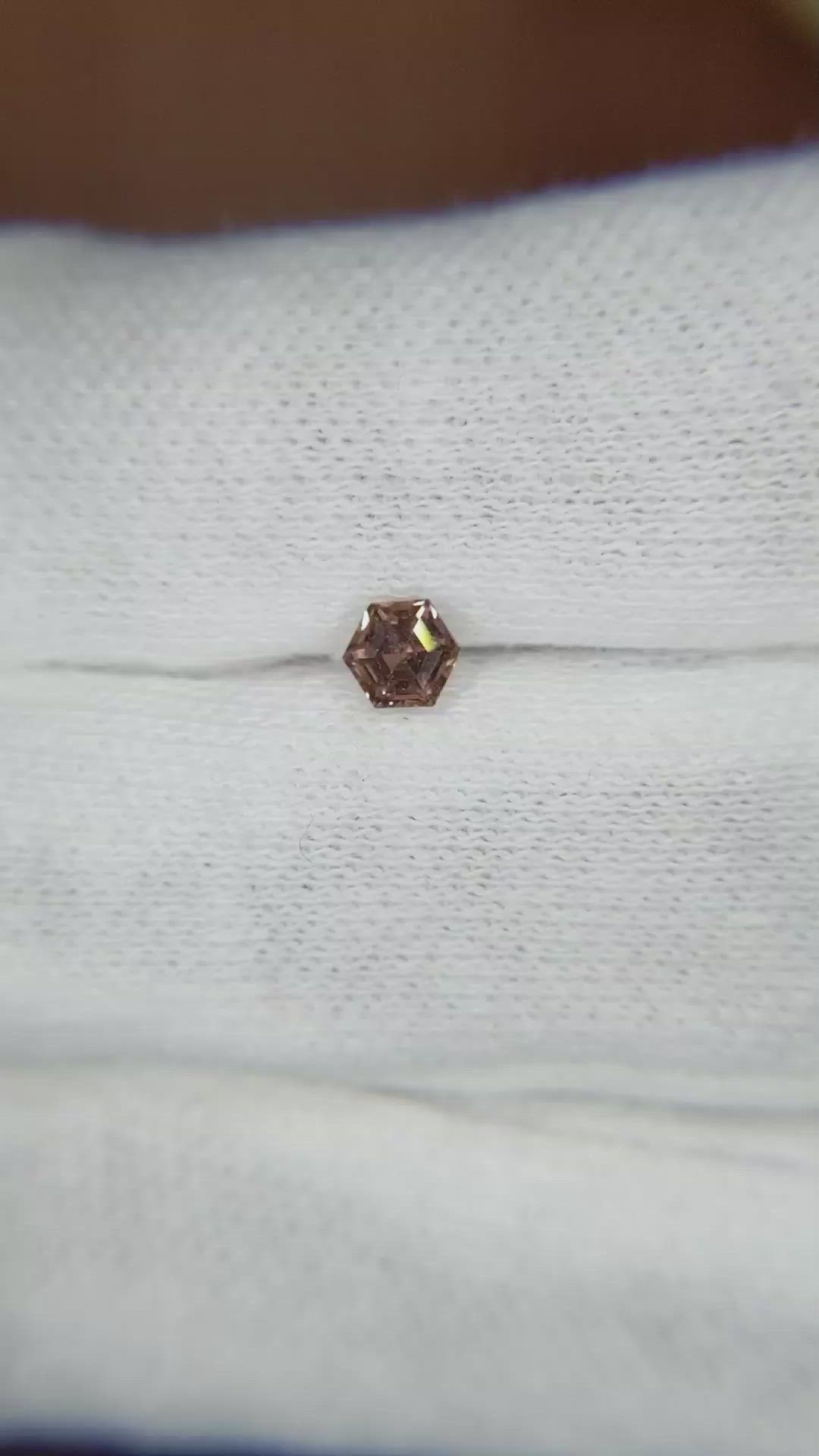 0.32 Ct. Orangish Brown Sapphire from Ceylon (Sri Lanka) Size Video