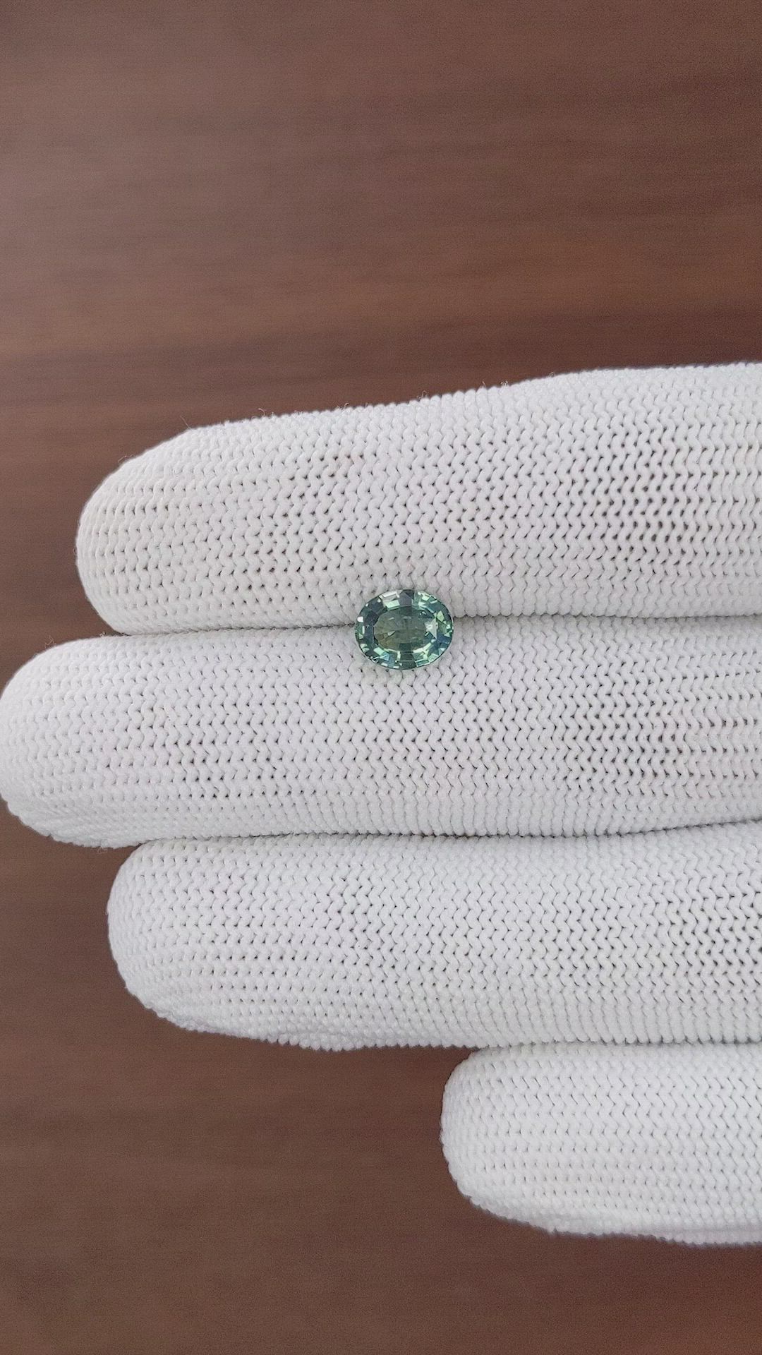 1.57 Ct. Bluish Green Sapphire from Madagascar Size Video