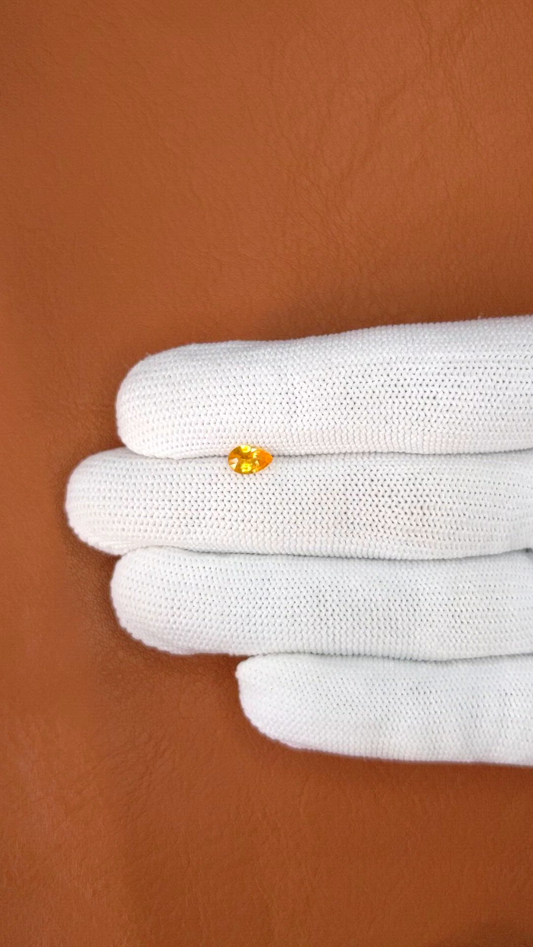 0.55 Ct. Yellowish Orange Sapphire from Ceylon (Sri Lanka) Size Video