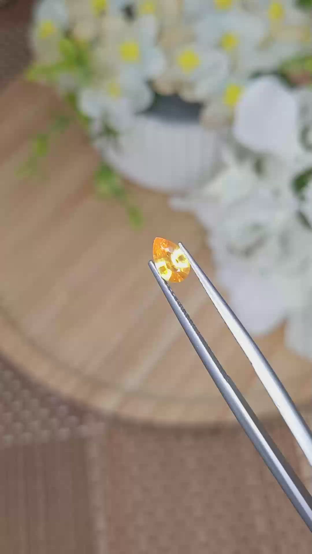 0.55 Ct. Yellowish Orange Sapphire from Ceylon (Sri Lanka) Size Video