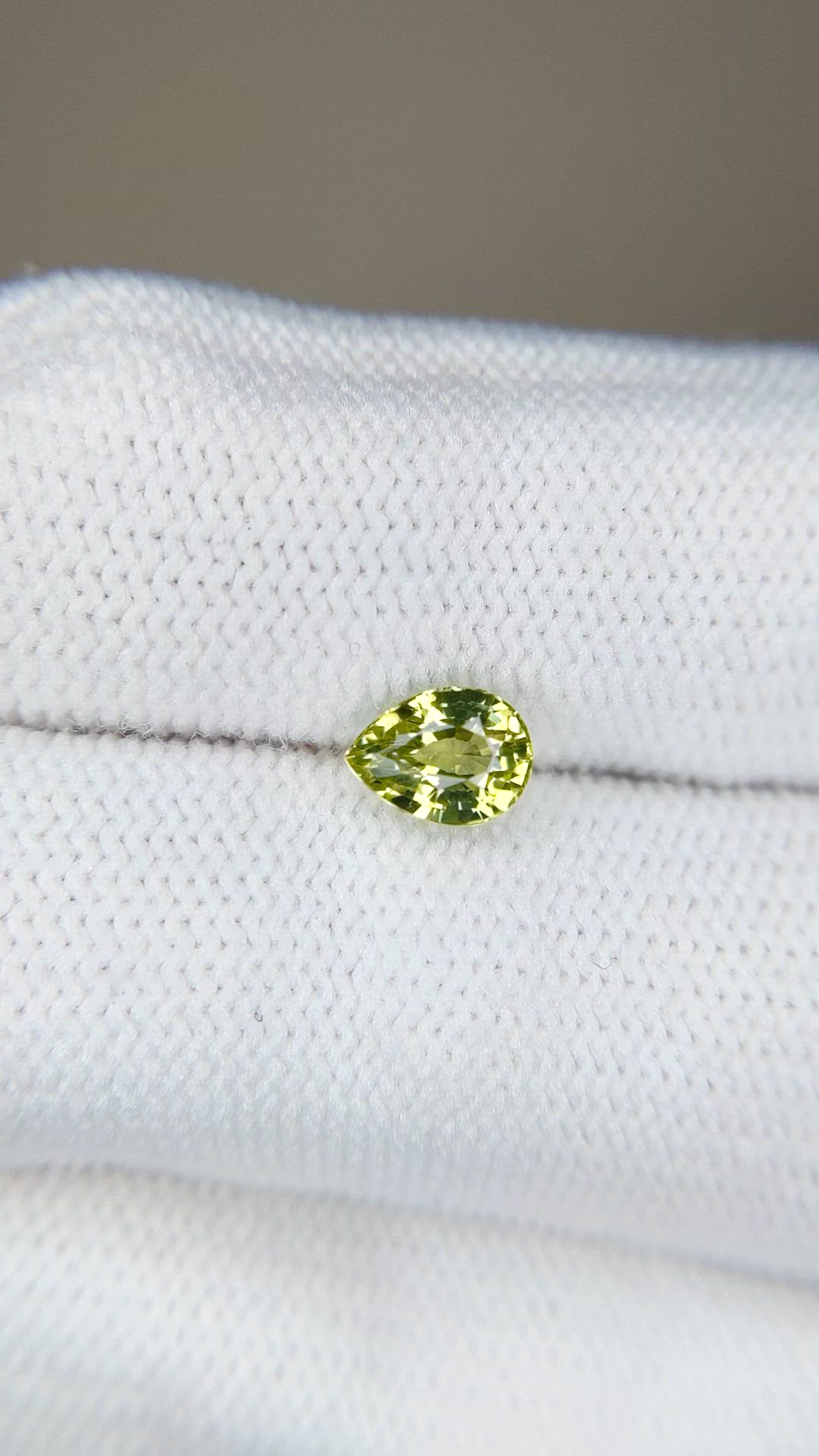 0.99 Ct. Greenish Yellow Sapphire from Madagascar Size Video
