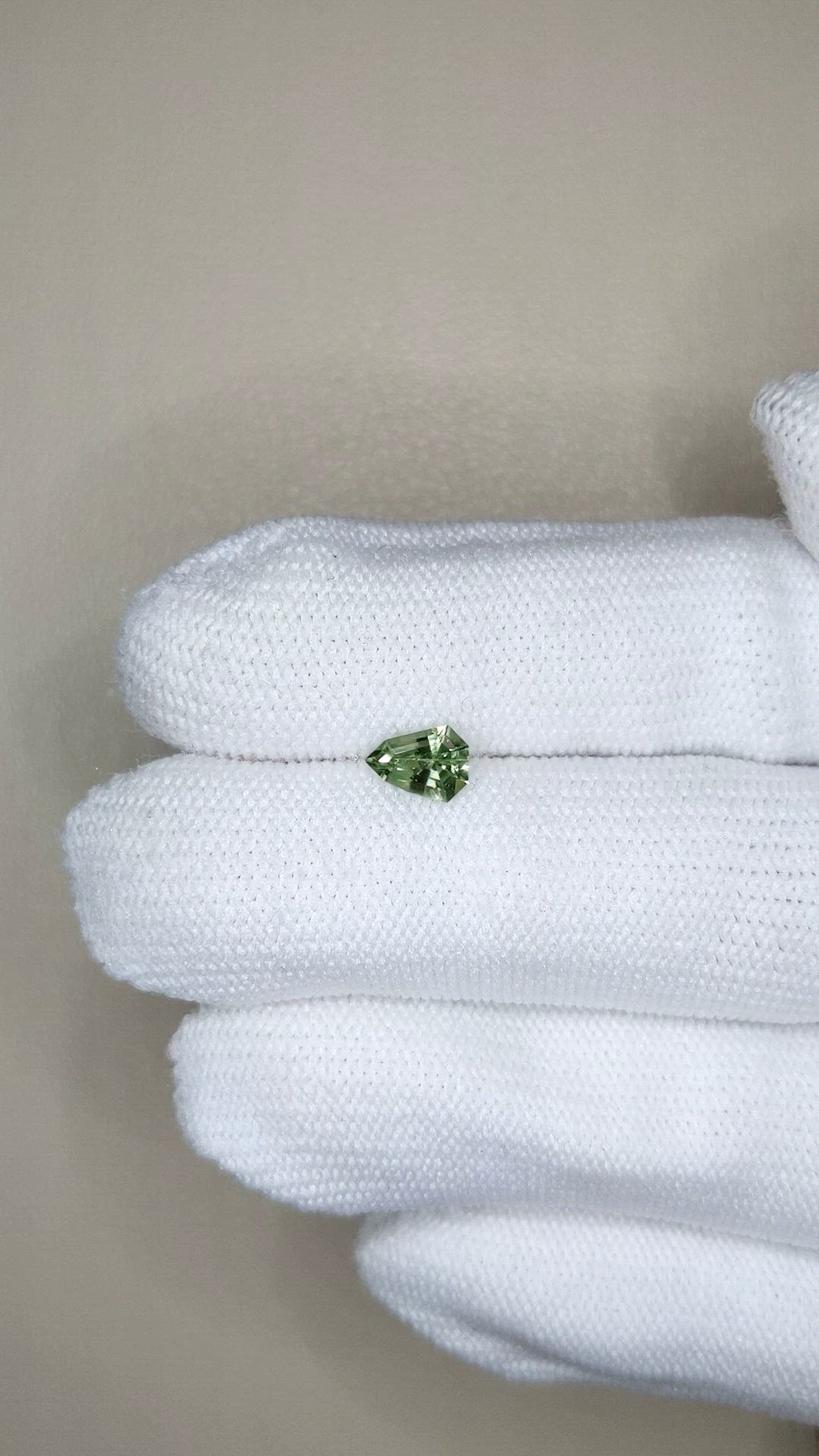 0.69 Ct. Yellowish Green Sapphire from Madagascar Size Video