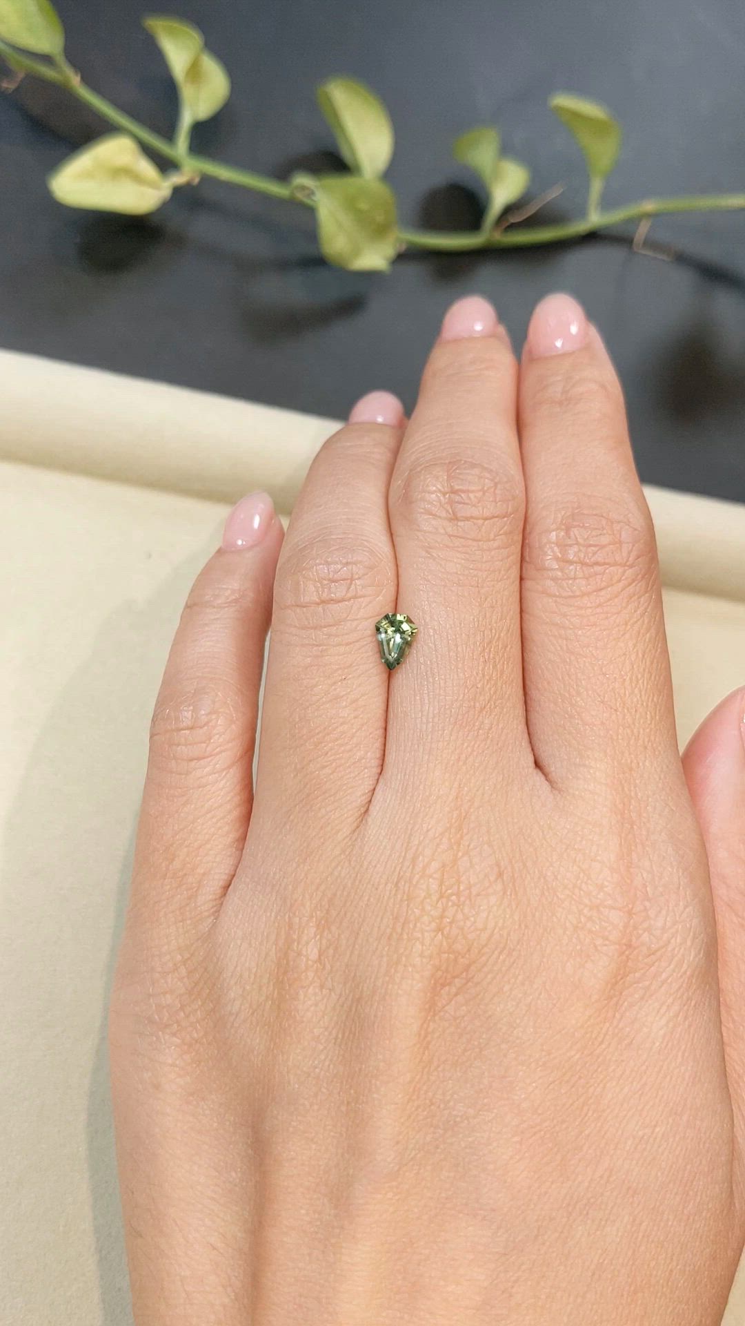 0.69 Ct. Yellowish Green Sapphire from Madagascar Size Video