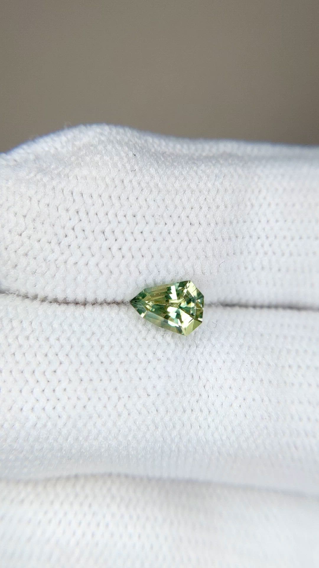 0.69 Ct. Yellowish Green Sapphire from Madagascar Size Video