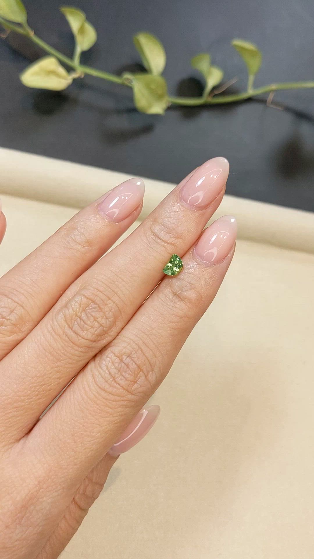 0.74 Ct. Yellowish Green Sapphire from Madagascar Size Video