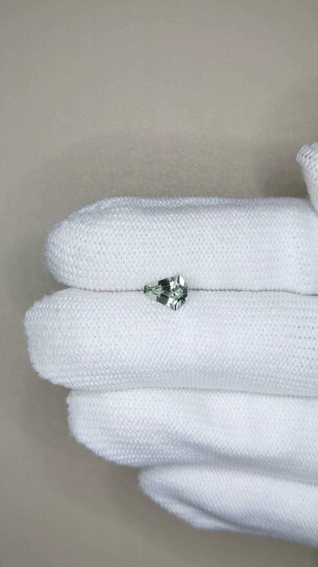0.92 Ct. Yellowish Green Sapphire from Madagascar Size Video