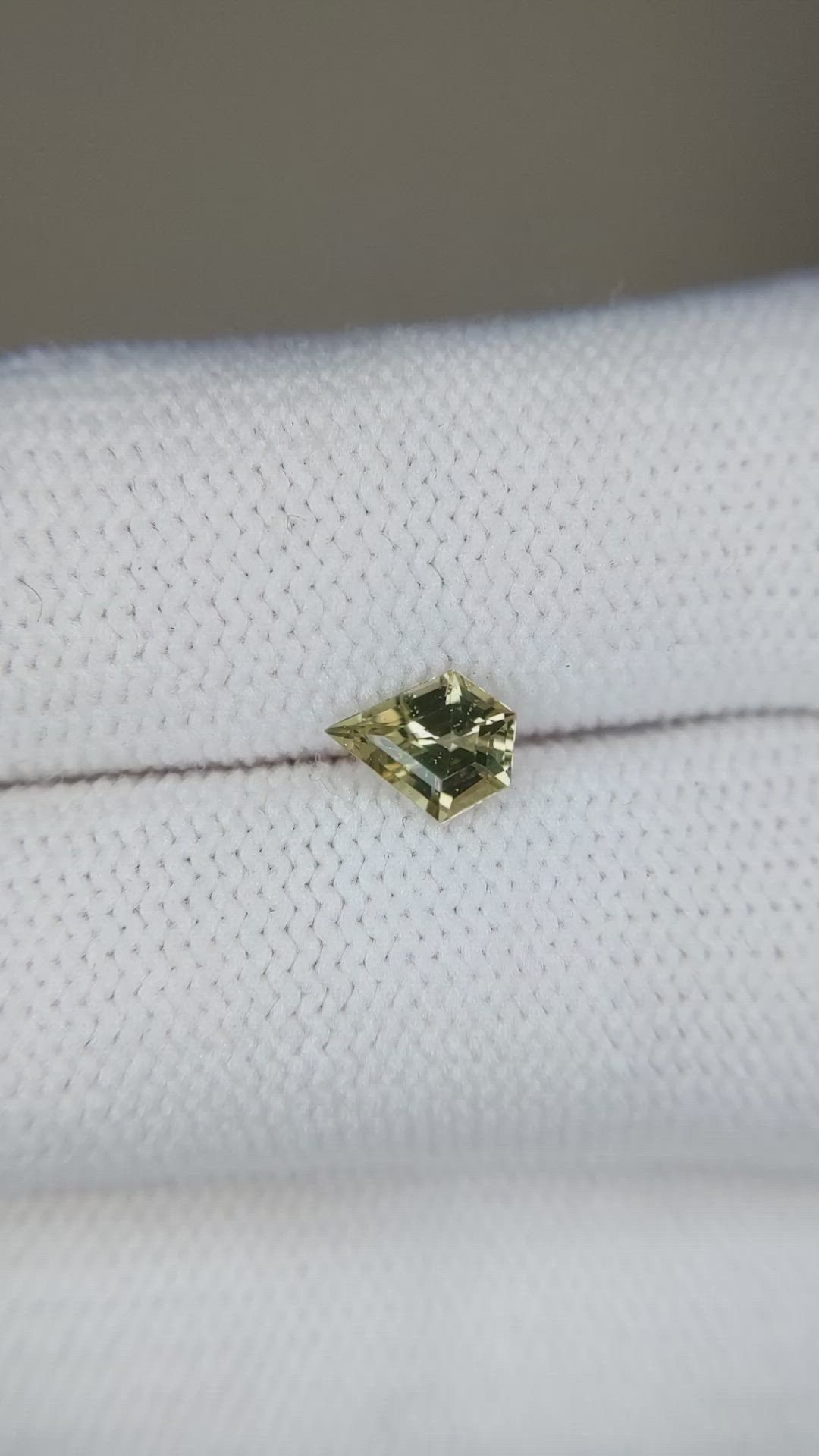 0.64 Ct. Yellowish Brown Sapphire from Madagascar Size Video