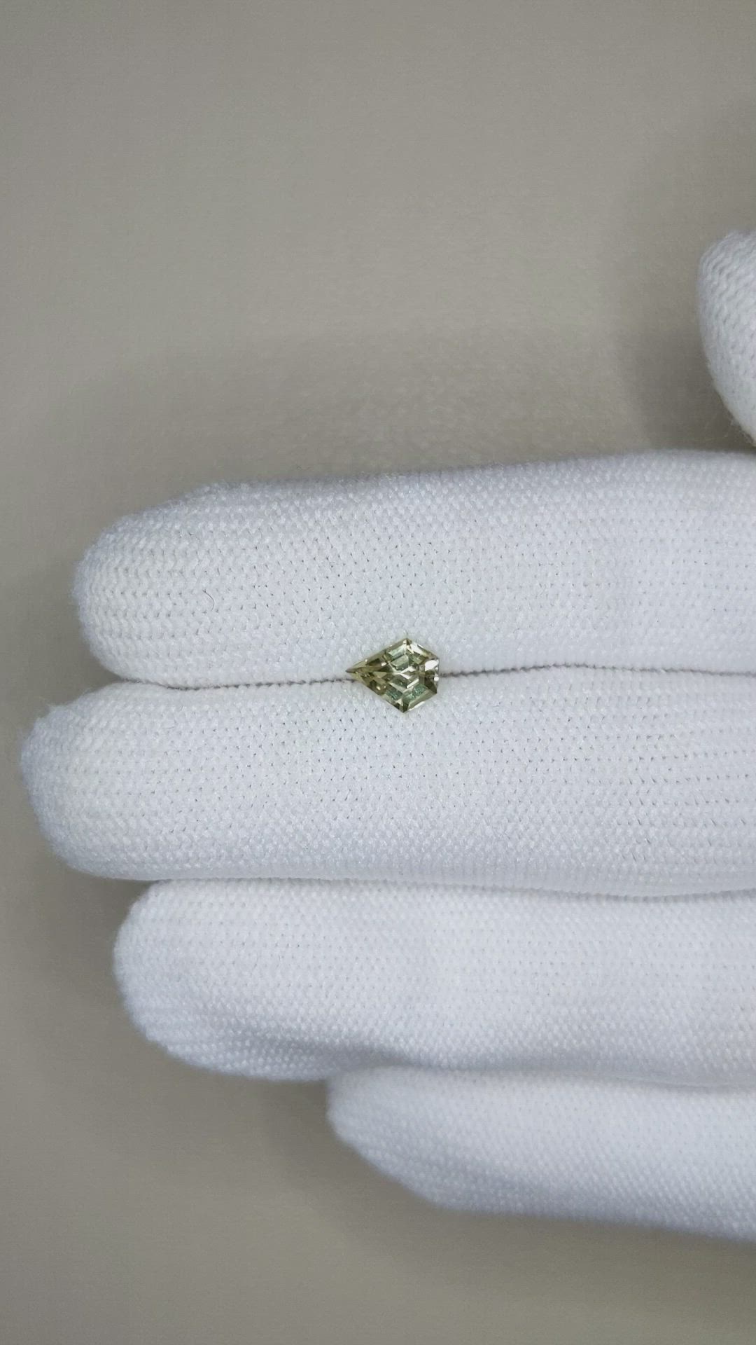 0.64 Ct. Yellowish Brown Sapphire from Madagascar Size Video