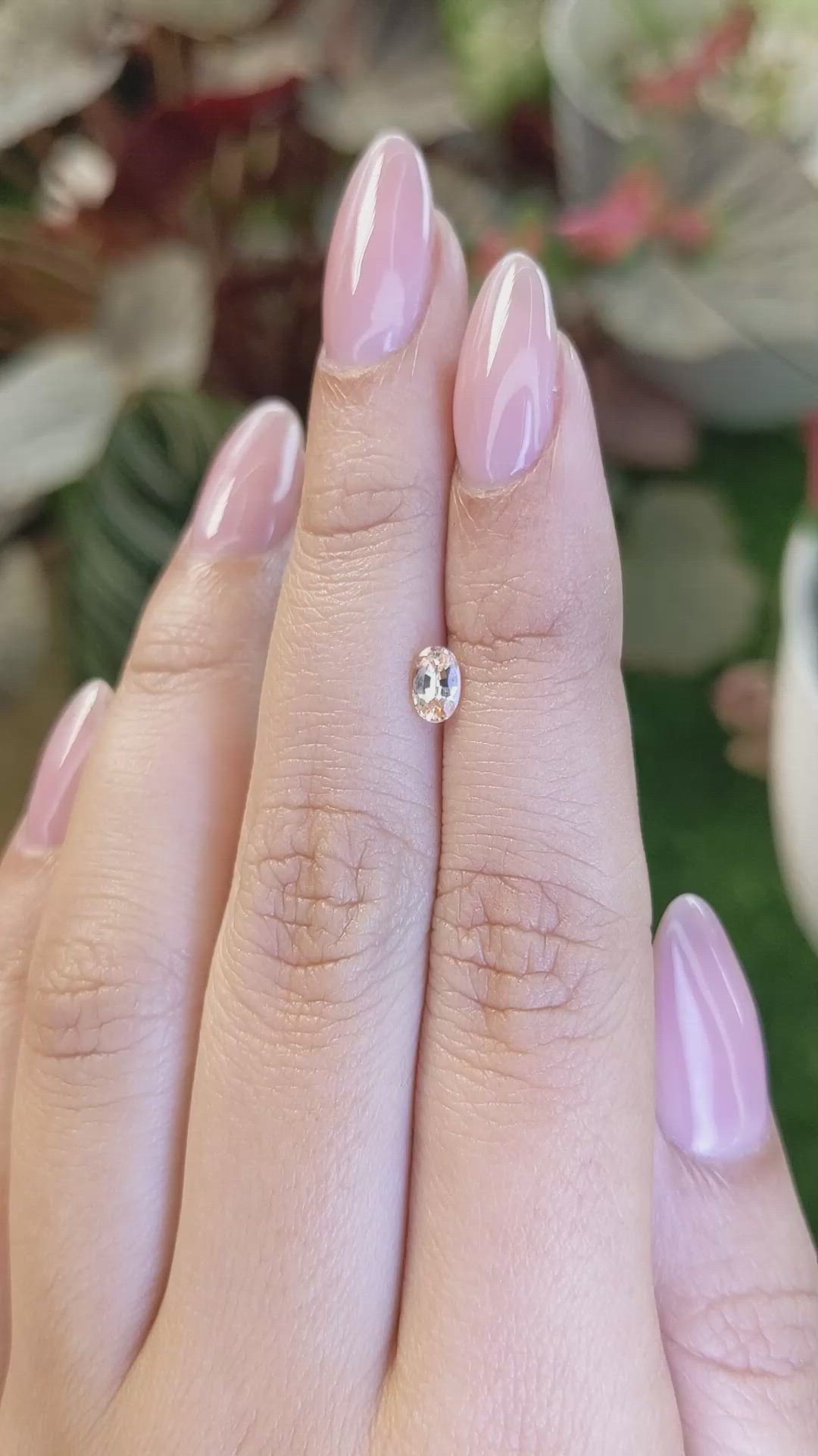 0.43 Ct. Peach Sapphire from Ceylon (Sri Lanka) Size Video