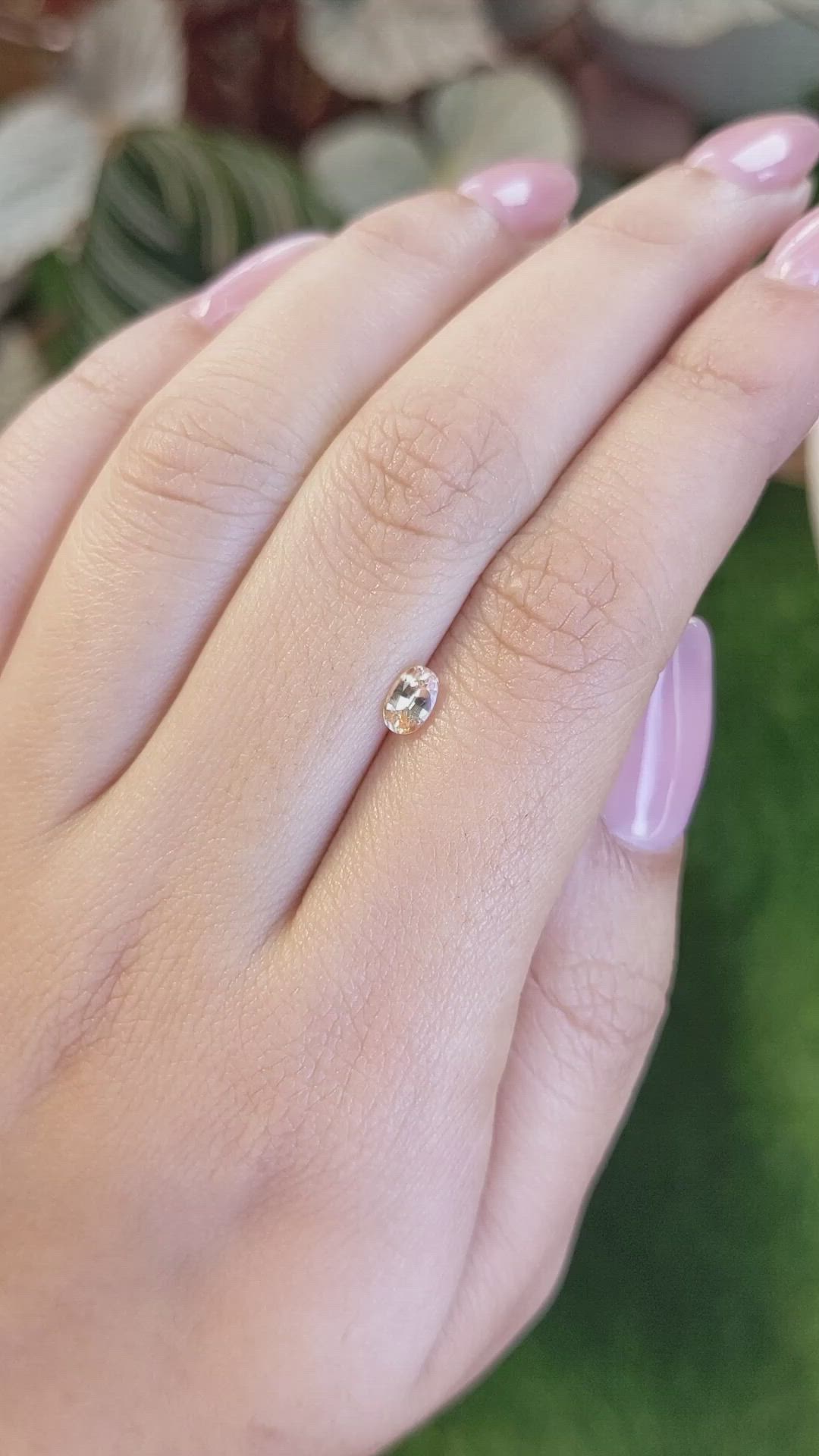 0.43 Ct. Peach Sapphire from Ceylon (Sri Lanka) Size Video