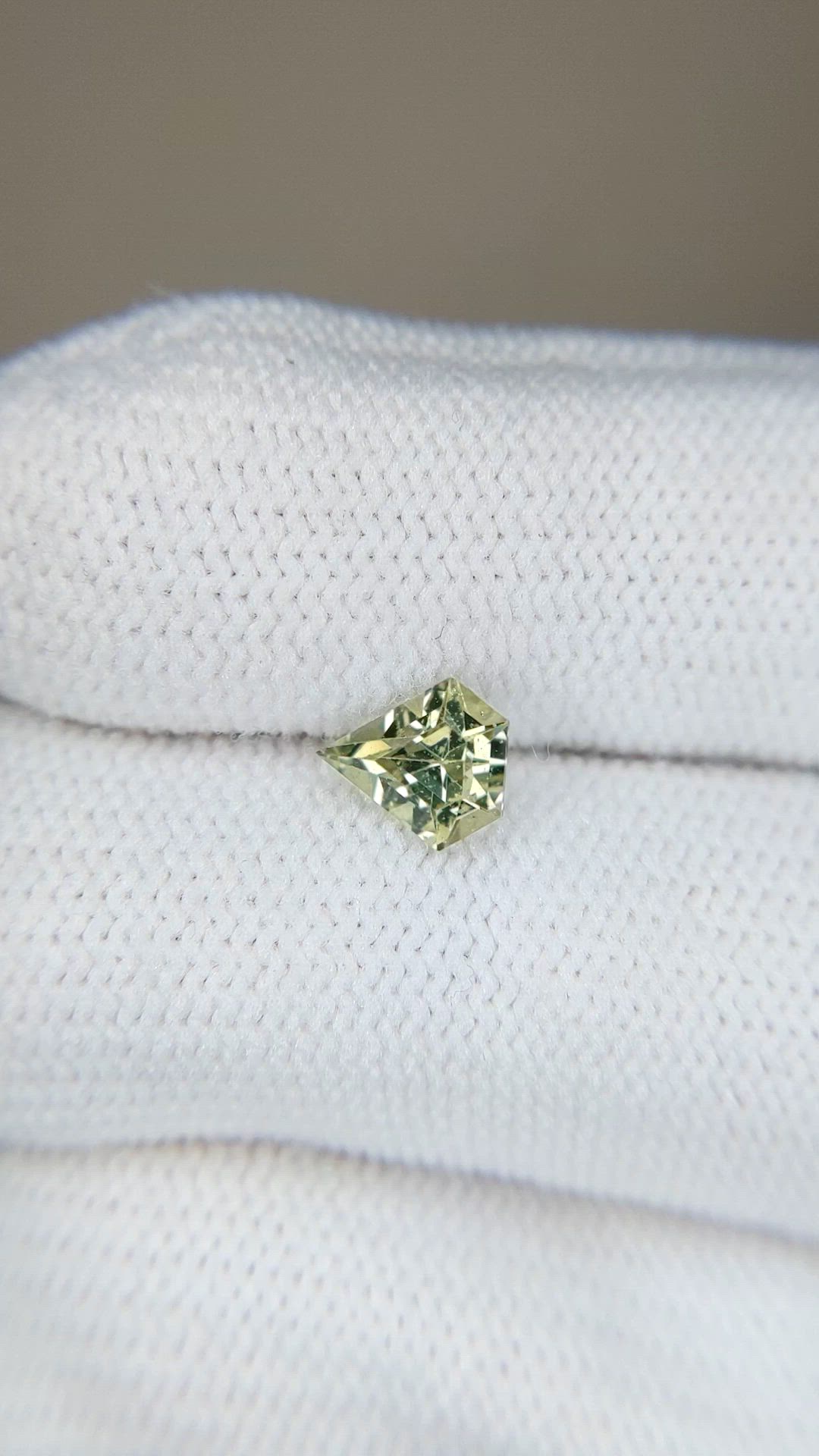 0.88 Ct. Yellowish Green Sapphire from Madagascar Size Video