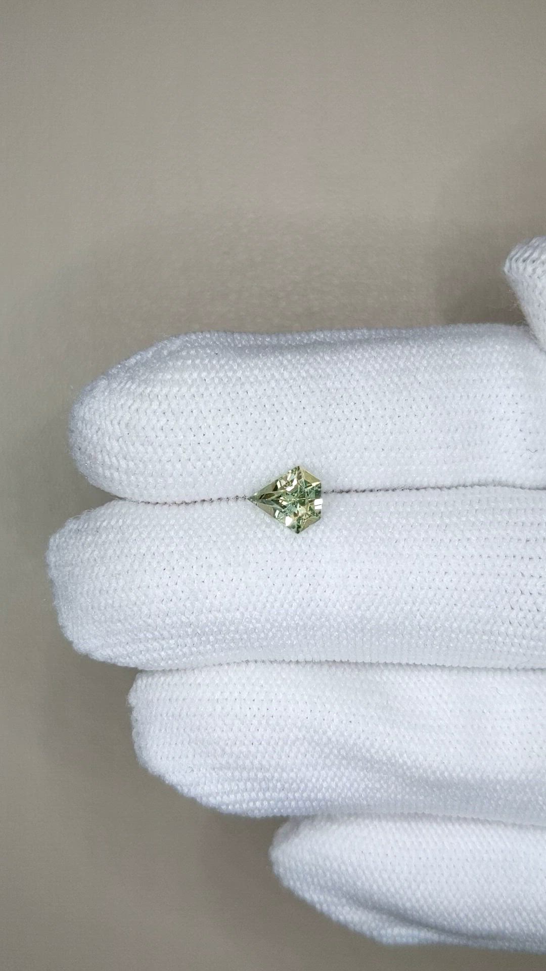 0.88 Ct. Yellowish Green Sapphire from Madagascar Size Video