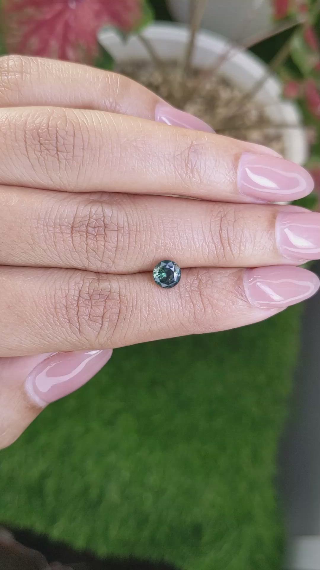 0.98 Ct. Bluish Green Sapphire from Madagascar Size Video