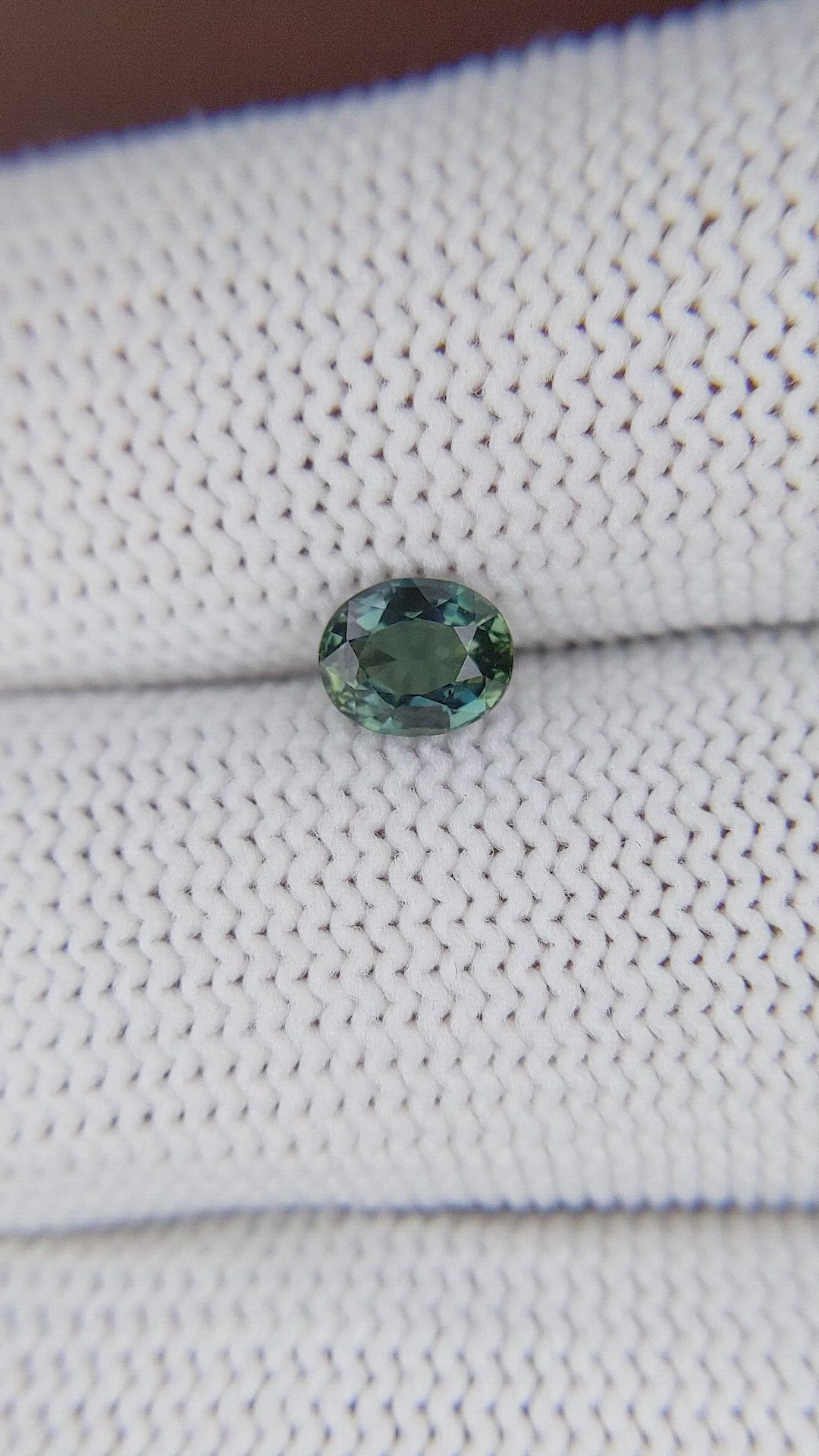 0.78 Ct. Bluish Green Sapphire from Tanzania Size Video