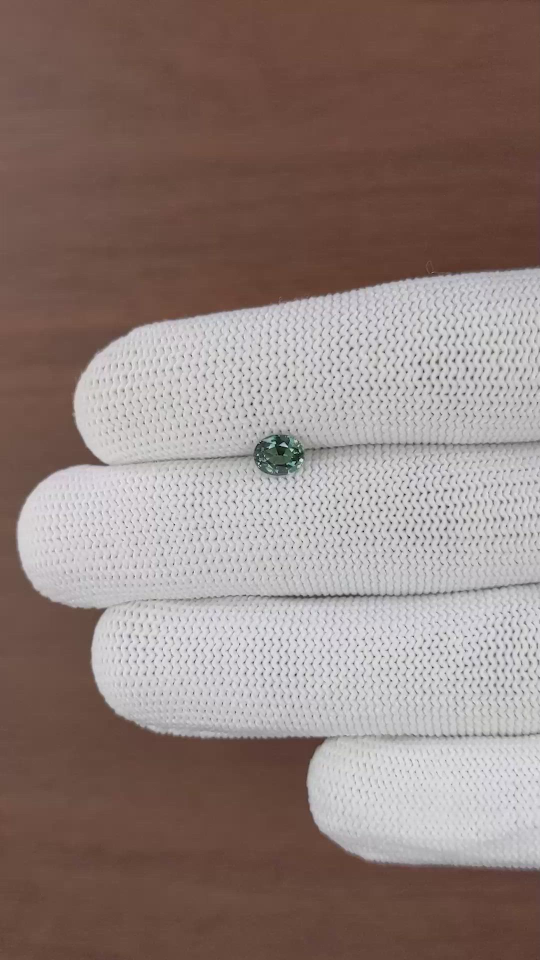 0.78 Ct. Bluish Green Sapphire from Tanzania Size Video