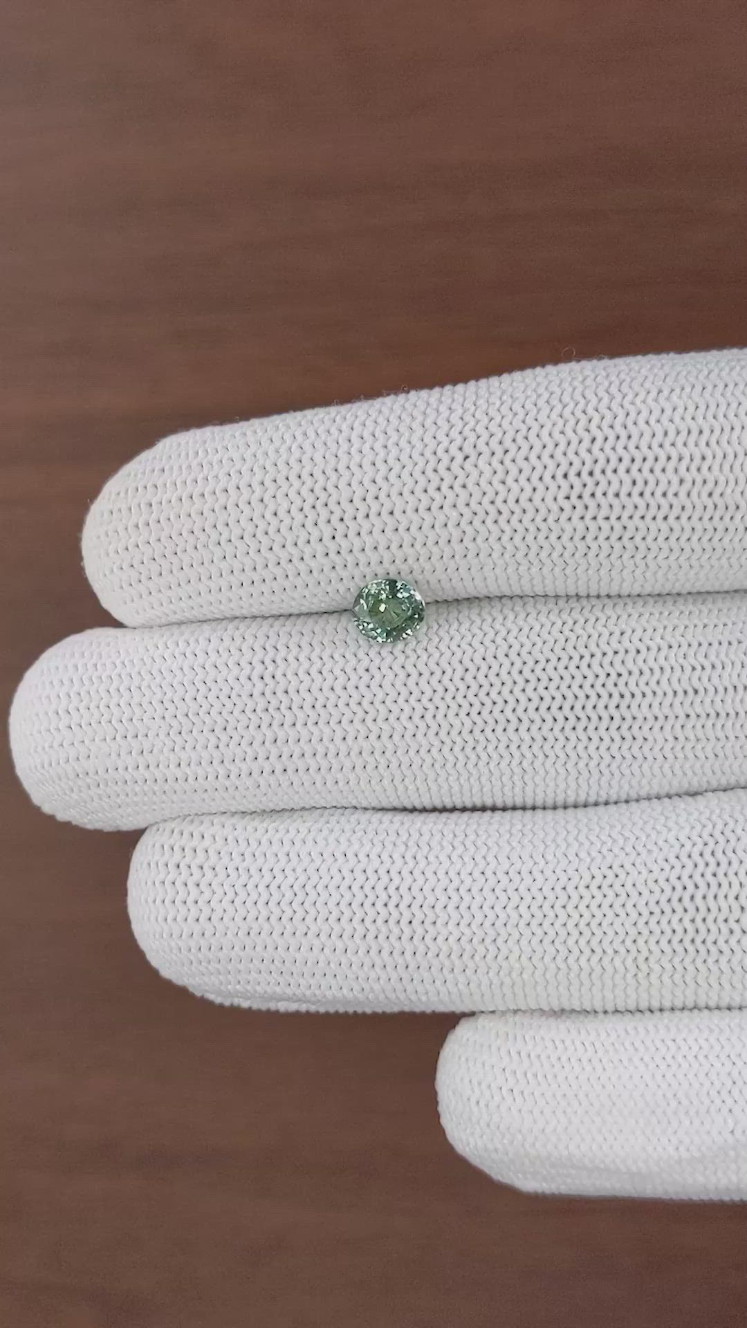 0.94 Ct. Bluish Green Sapphire from Tanzania Size Video