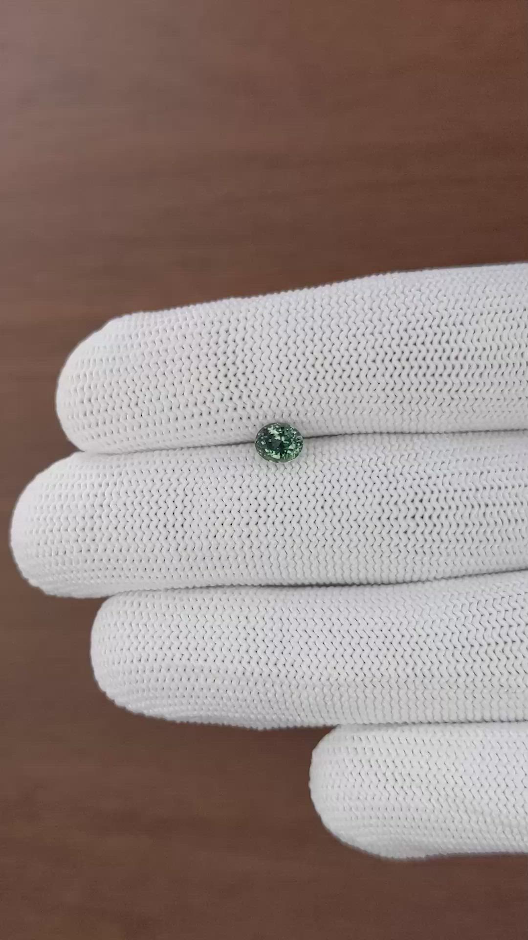 0.88 Ct. Bluish Green Sapphire from Tanzania Size Video
