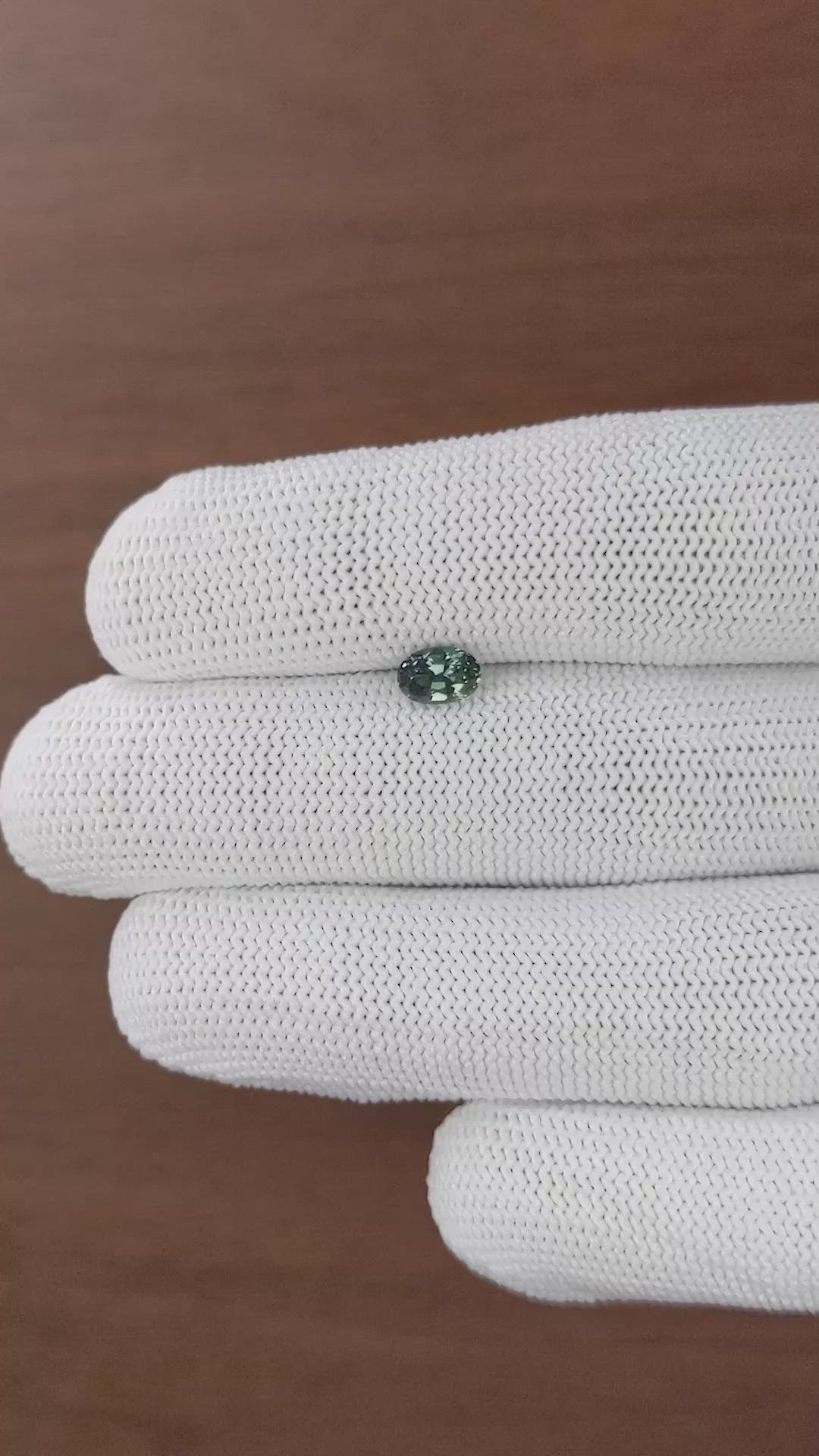 0.78 Ct. Bluish Green Sapphire from Tanzania Size Video