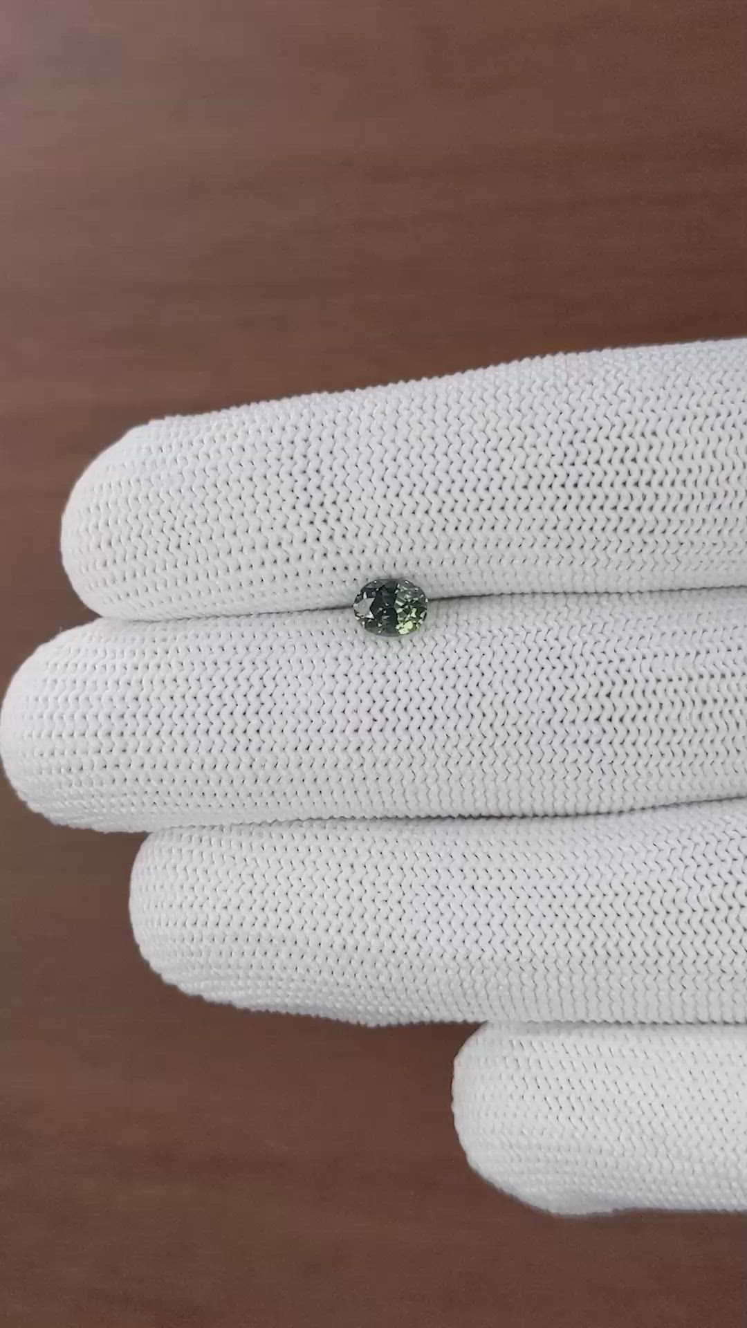 0.84 Ct. Yellowish Green Sapphire from Tanzania Size Video
