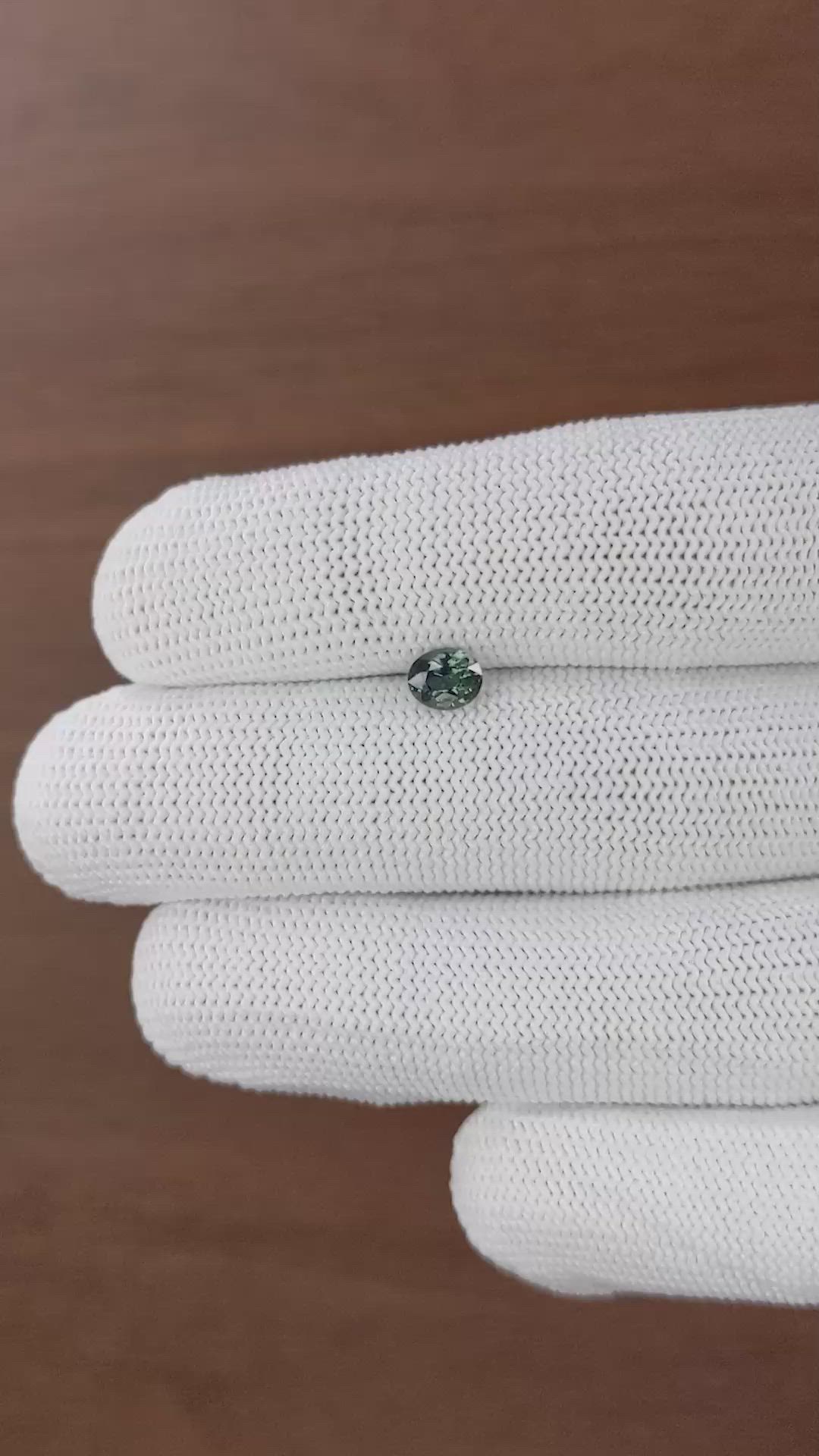 0.74 Ct. Bluish Green Sapphire from Tanzania Size Video