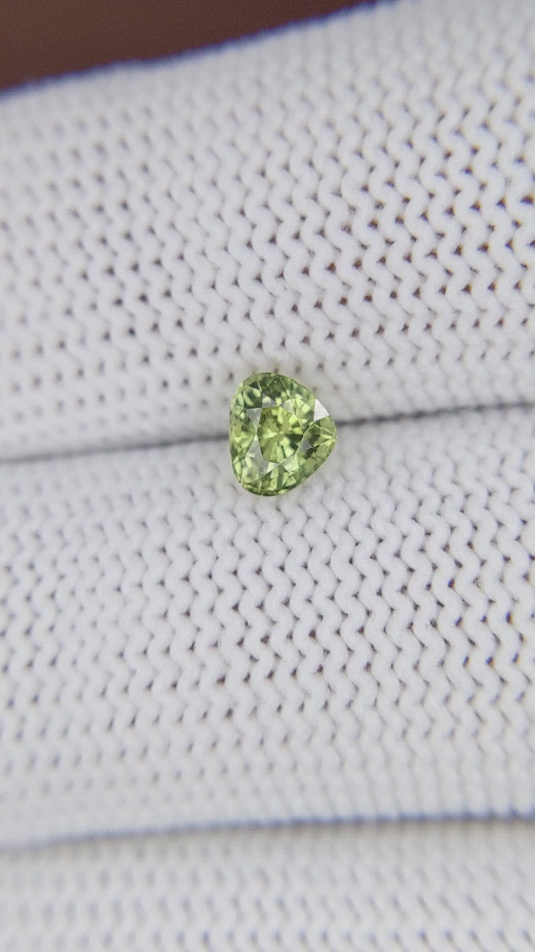 0.68 Ct. Yellowish Green Sapphire from Tanzania Size Video