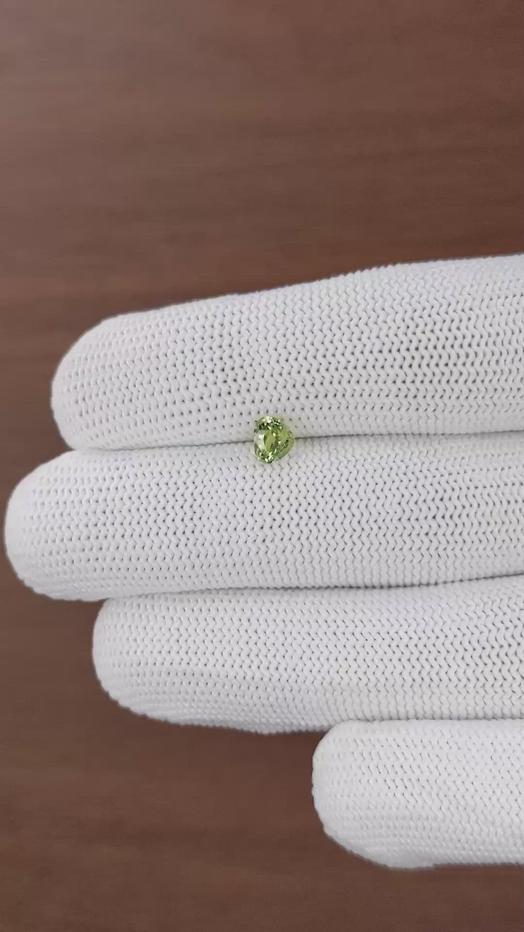 0.68 Ct. Yellowish Green Sapphire from Tanzania Size Video