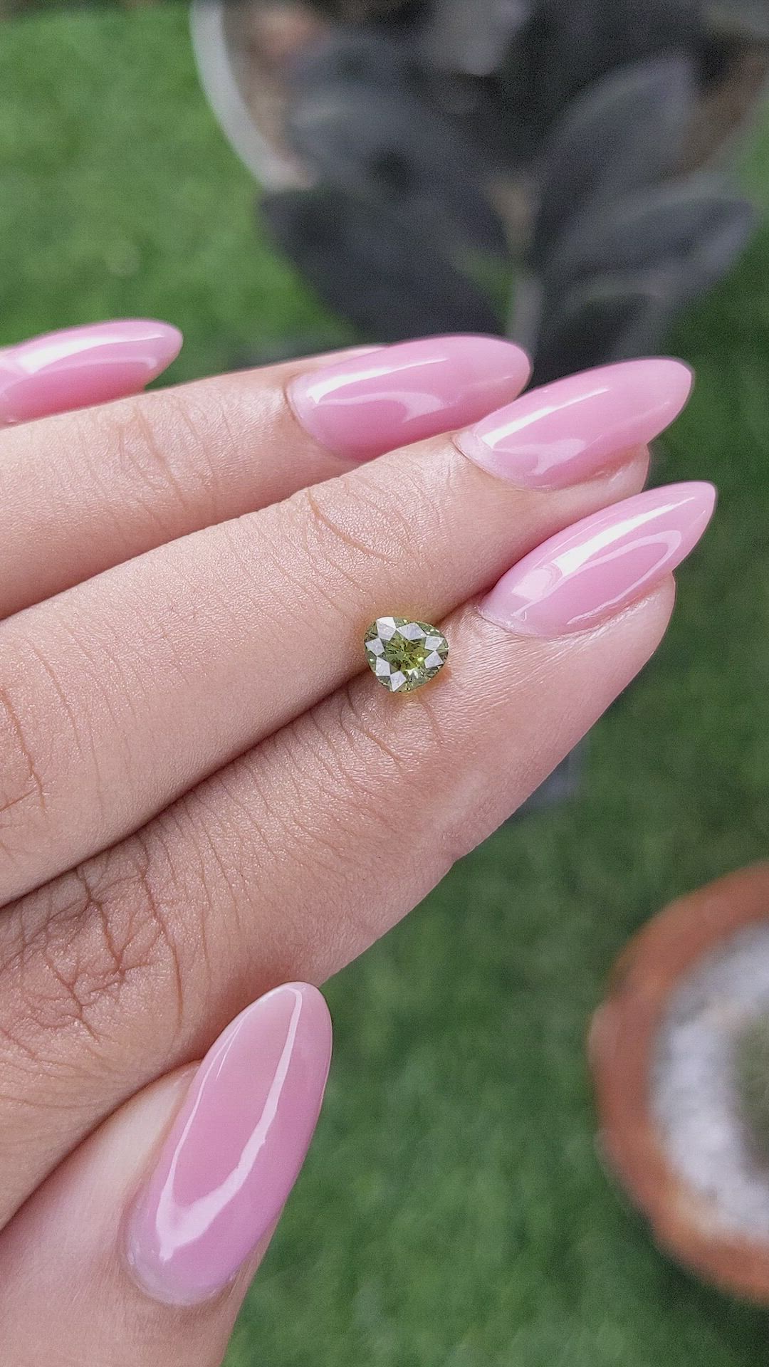 0.68 Ct. Yellowish Green Sapphire from Tanzania Size Video