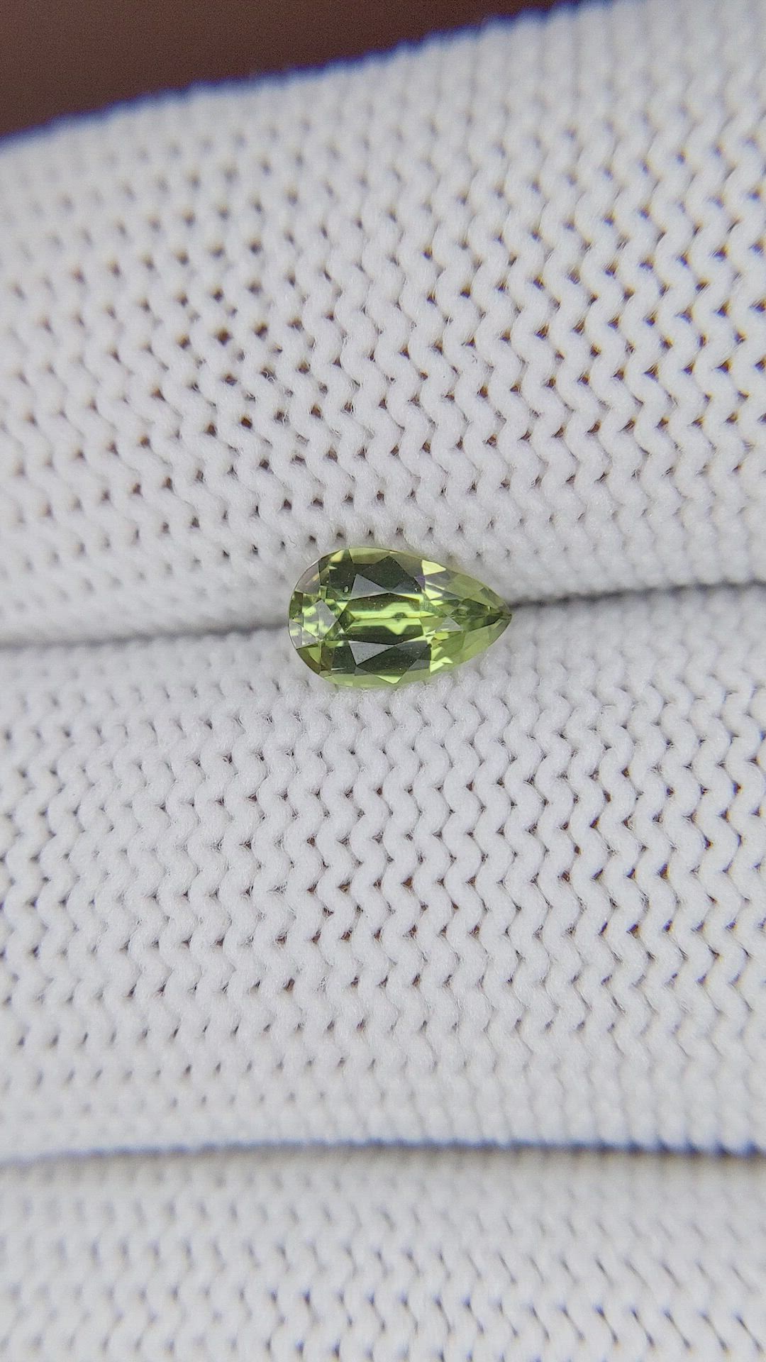 0.66 Ct. Yellowish Green Sapphire from Tanzania Size Video
