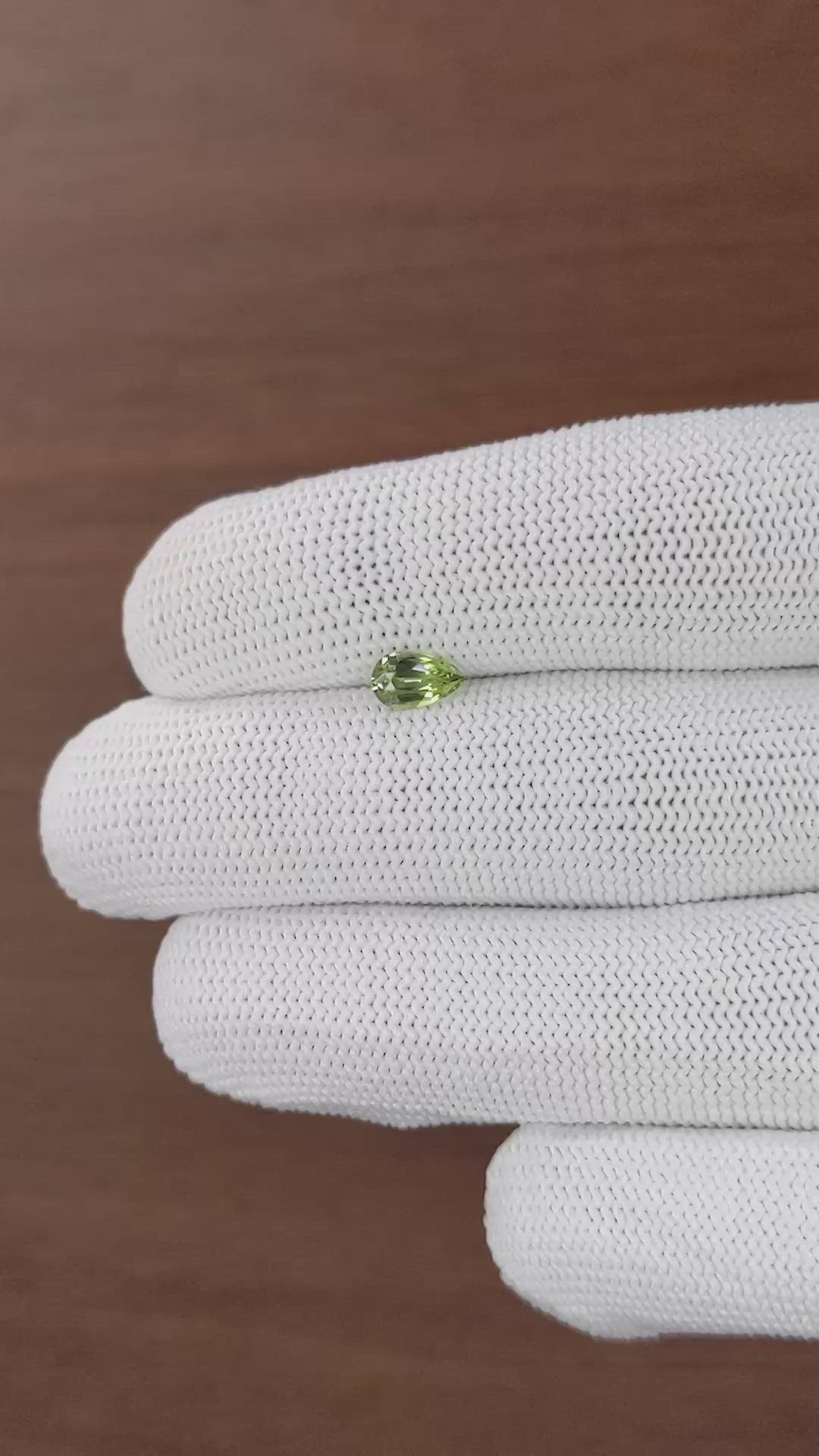 0.66 Ct. Yellowish Green Sapphire from Tanzania Size Video