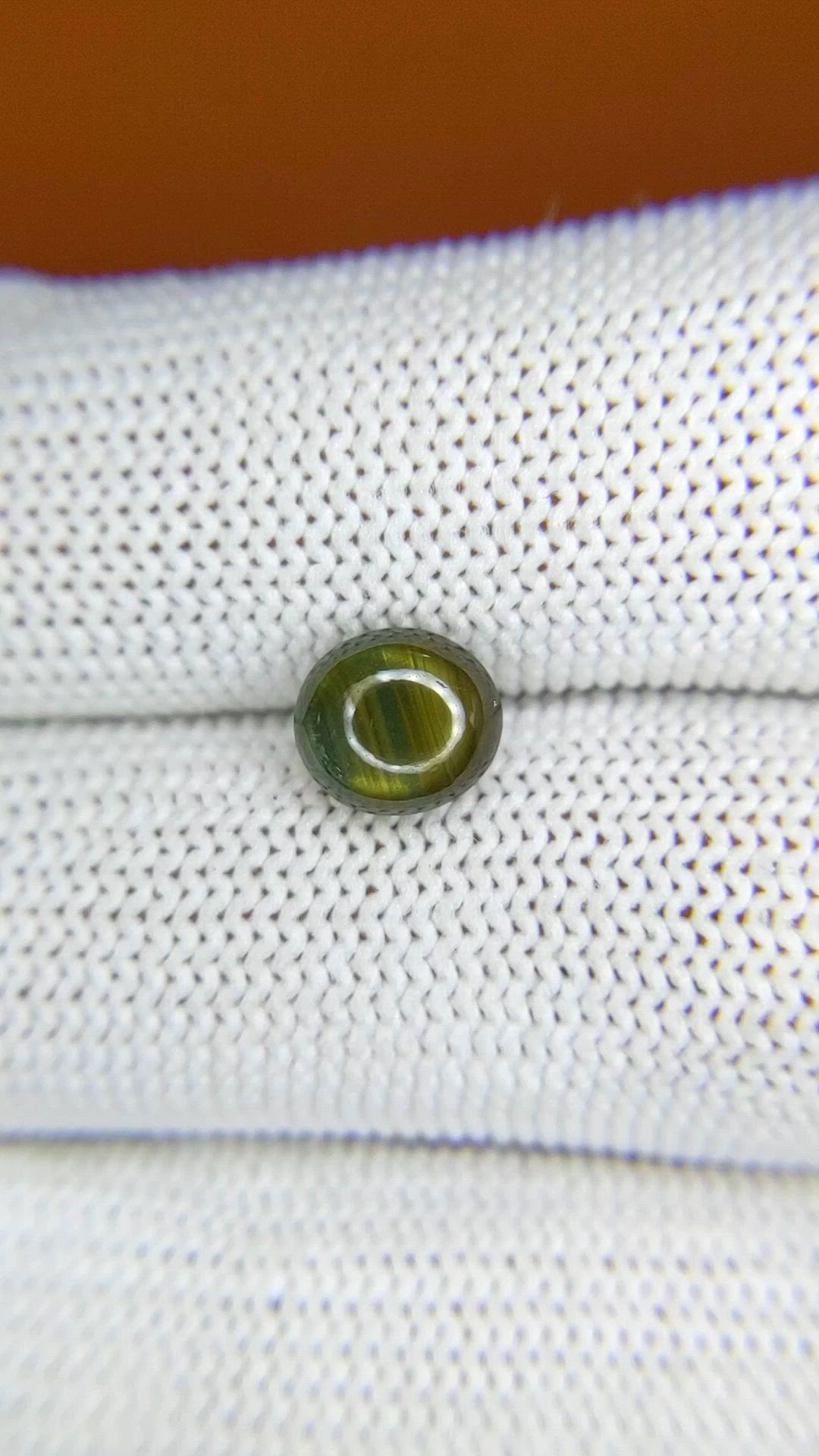 2.11 Ct. Greenish Brown Star Sapphire from Ceylon (Sri Lanka) Size Video