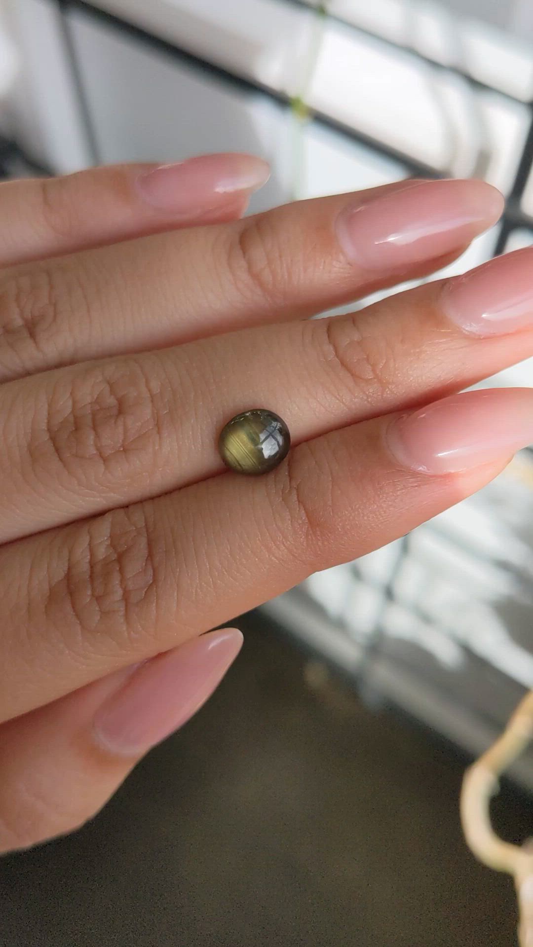 2.11 Ct. Greenish Brown Star Sapphire from Ceylon (Sri Lanka) Size Video