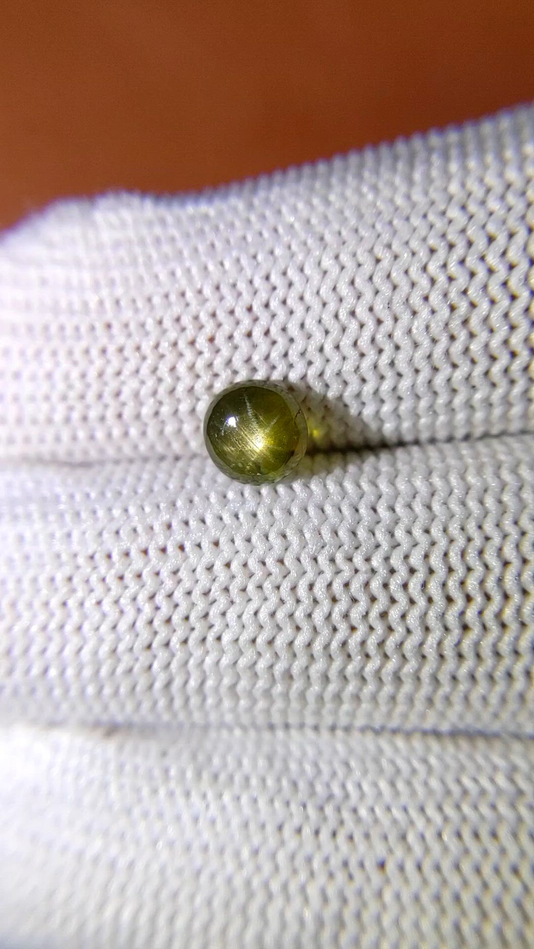 1.33 Ct. Brownish Green Star Sapphire from Ceylon (Sri Lanka) Size Video