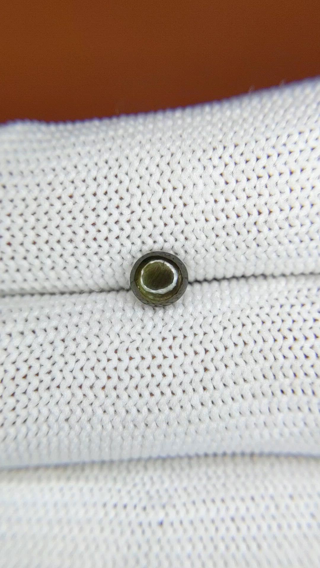 0.79 Ct. Greenish Brown Star Sapphire from Ceylon (Sri Lanka) Size Video