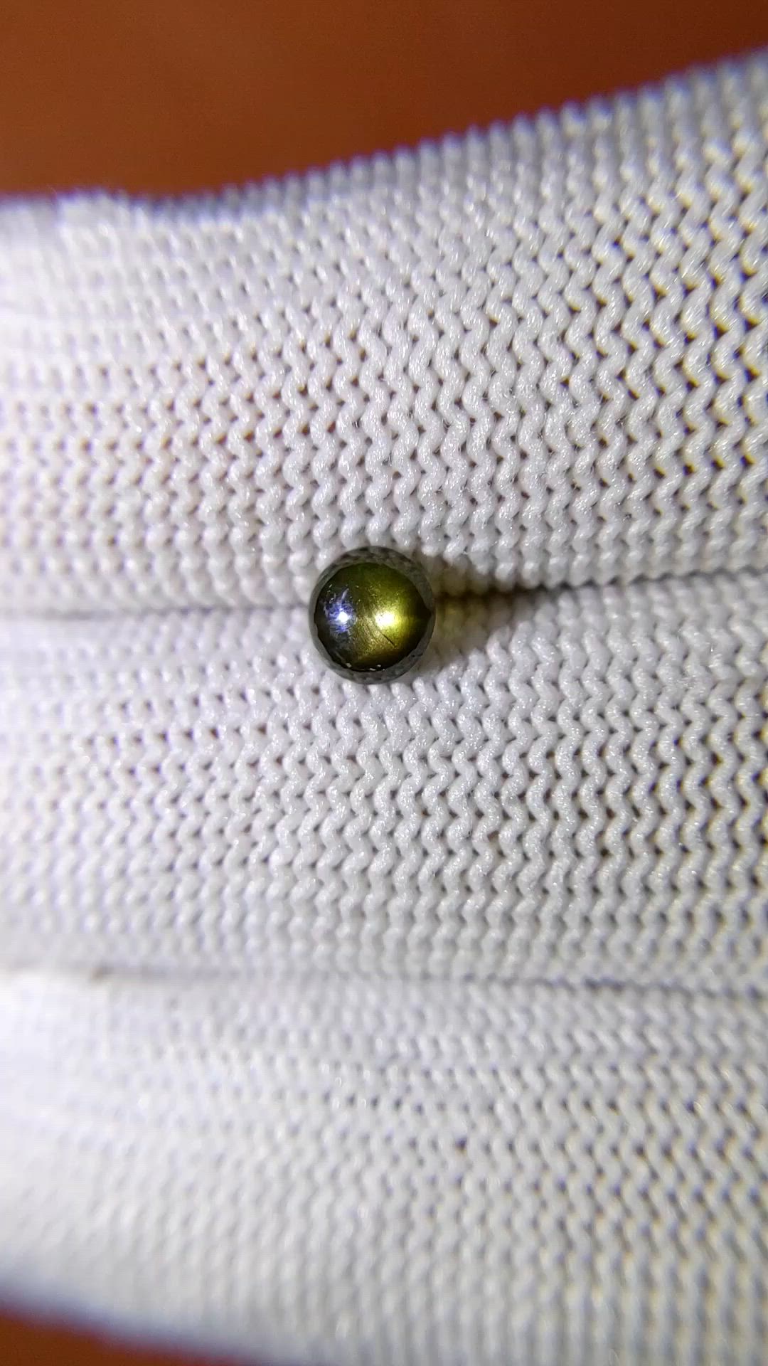 0.79 Ct. Greenish Brown Star Sapphire from Ceylon (Sri Lanka) Size Video