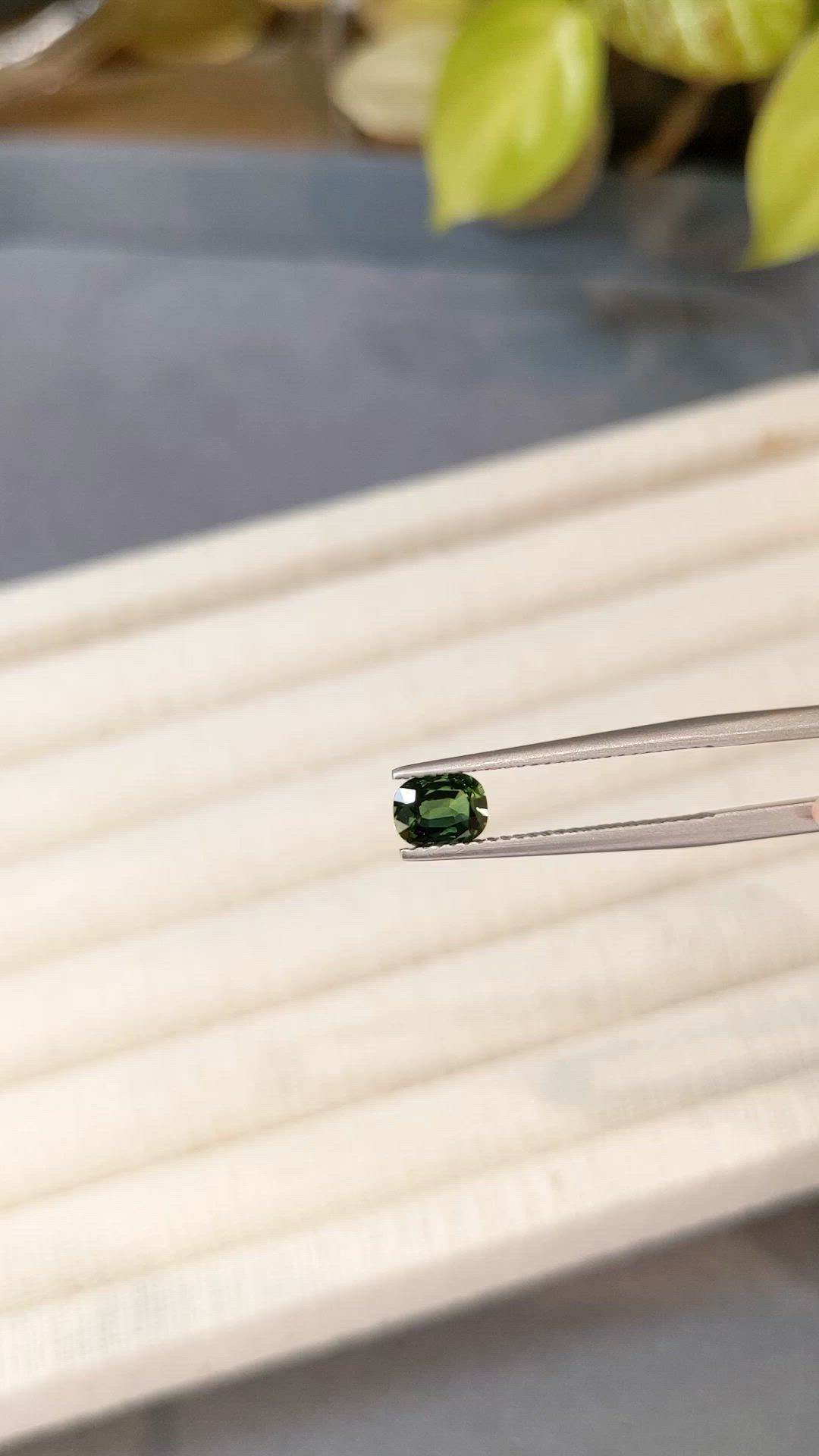 0.72 Ct. Bluish Green Sapphire from Thailand Size Video