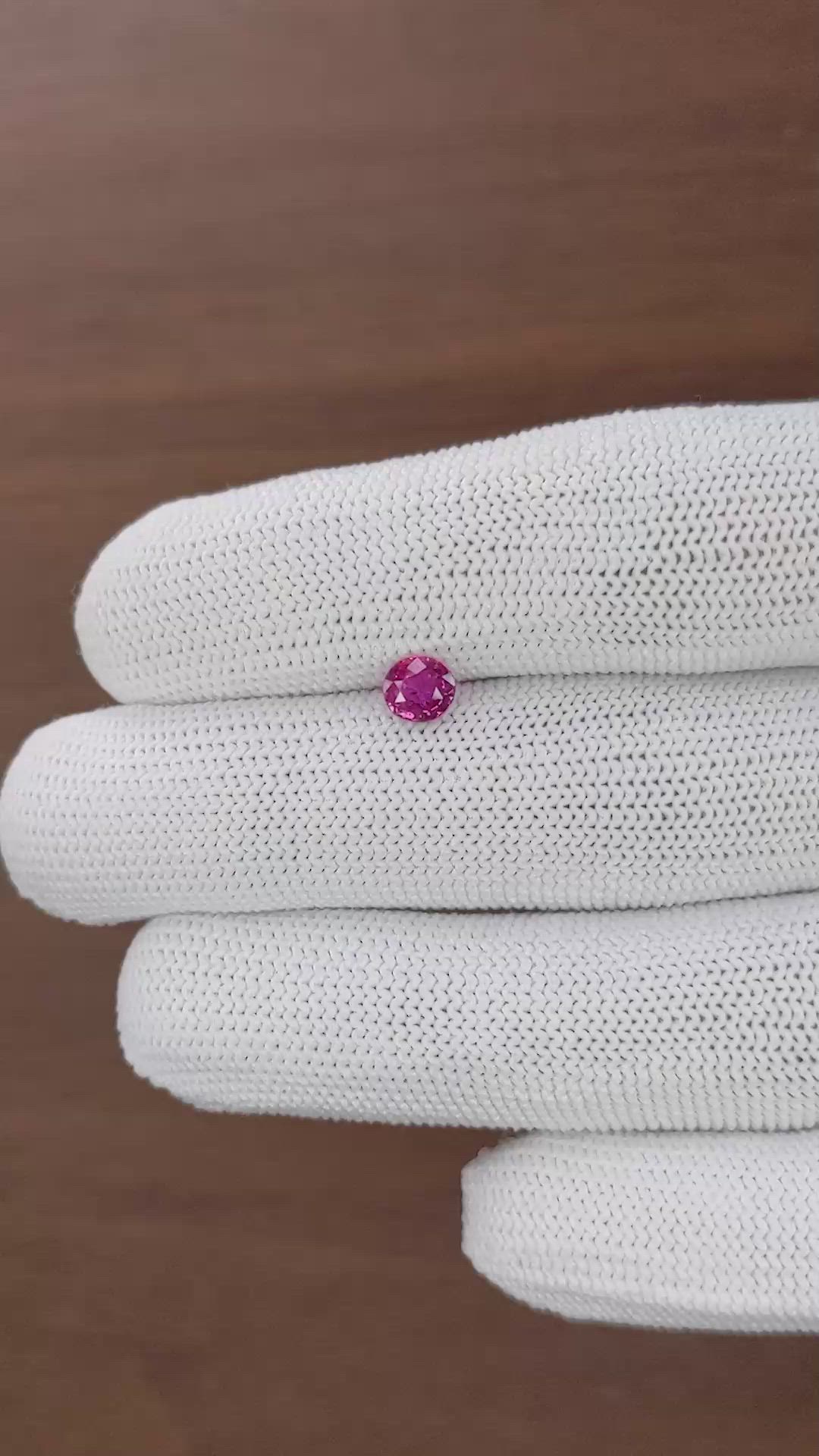 0.68 Ct. Purplish Pink Sapphire from Mozambique Size Video
