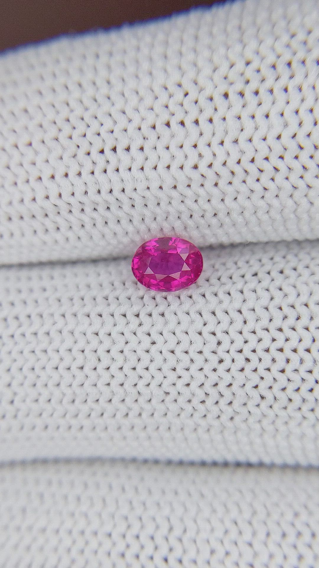 0.59 Ct. Reddish Pink Sapphire from Mozambique Size Video
