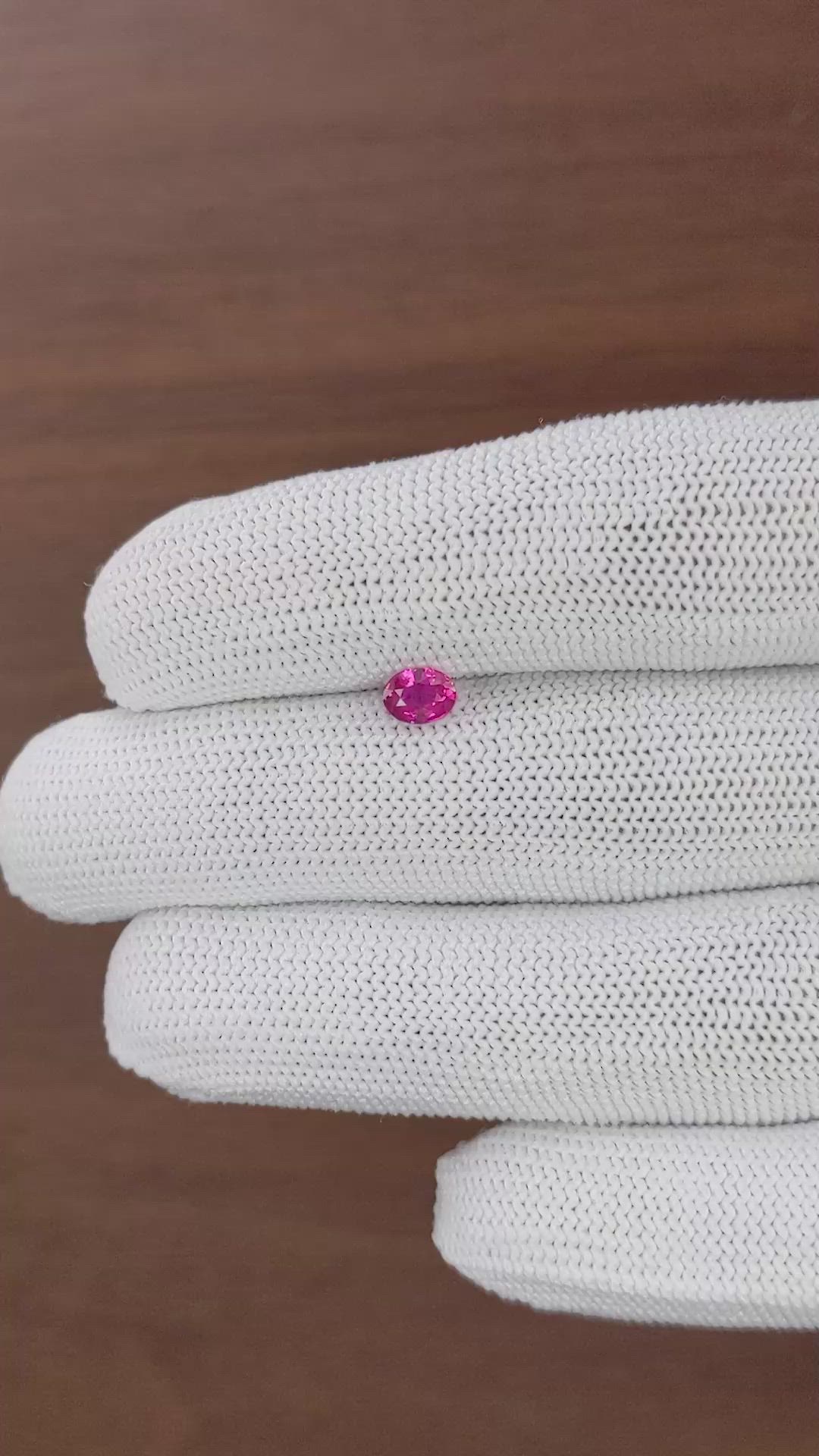 0.59 Ct. Reddish Pink Sapphire from Mozambique Size Video