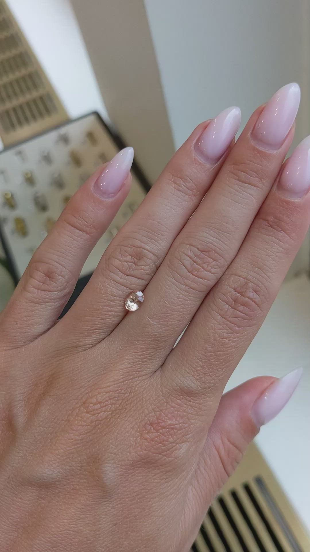 0.66 Ct. Peach Sapphire from Ceylon (Sri Lanka) Size Video