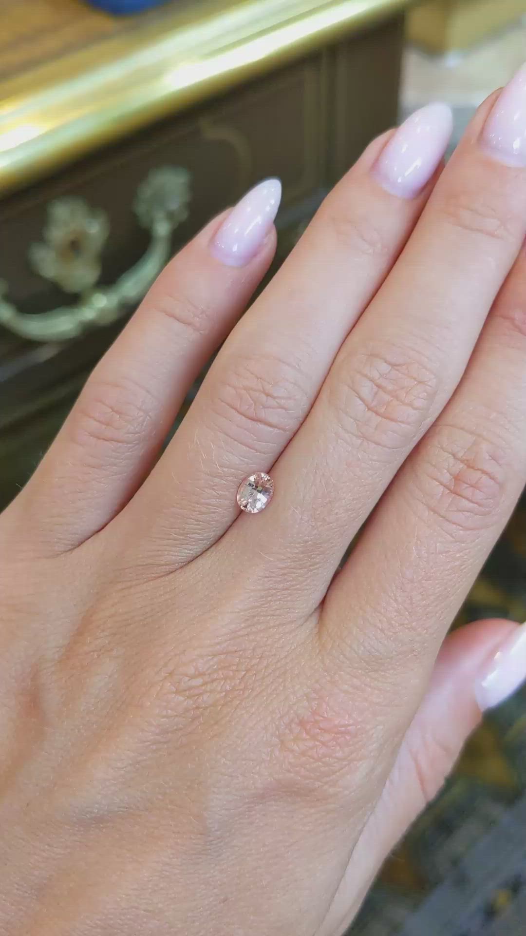 0.66 Ct. Peach Sapphire from Ceylon (Sri Lanka) Size Video