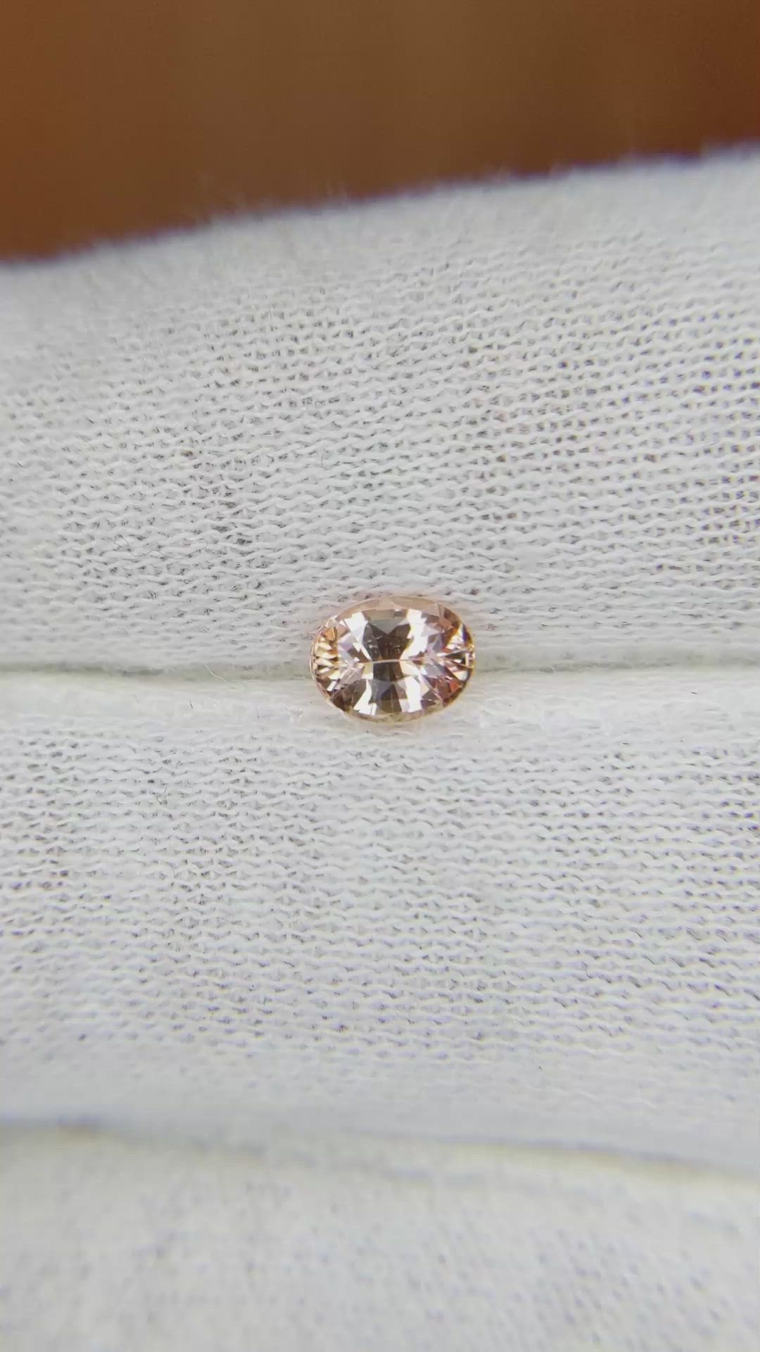 0.66 Ct. Peach Sapphire from Ceylon (Sri Lanka) Size Video