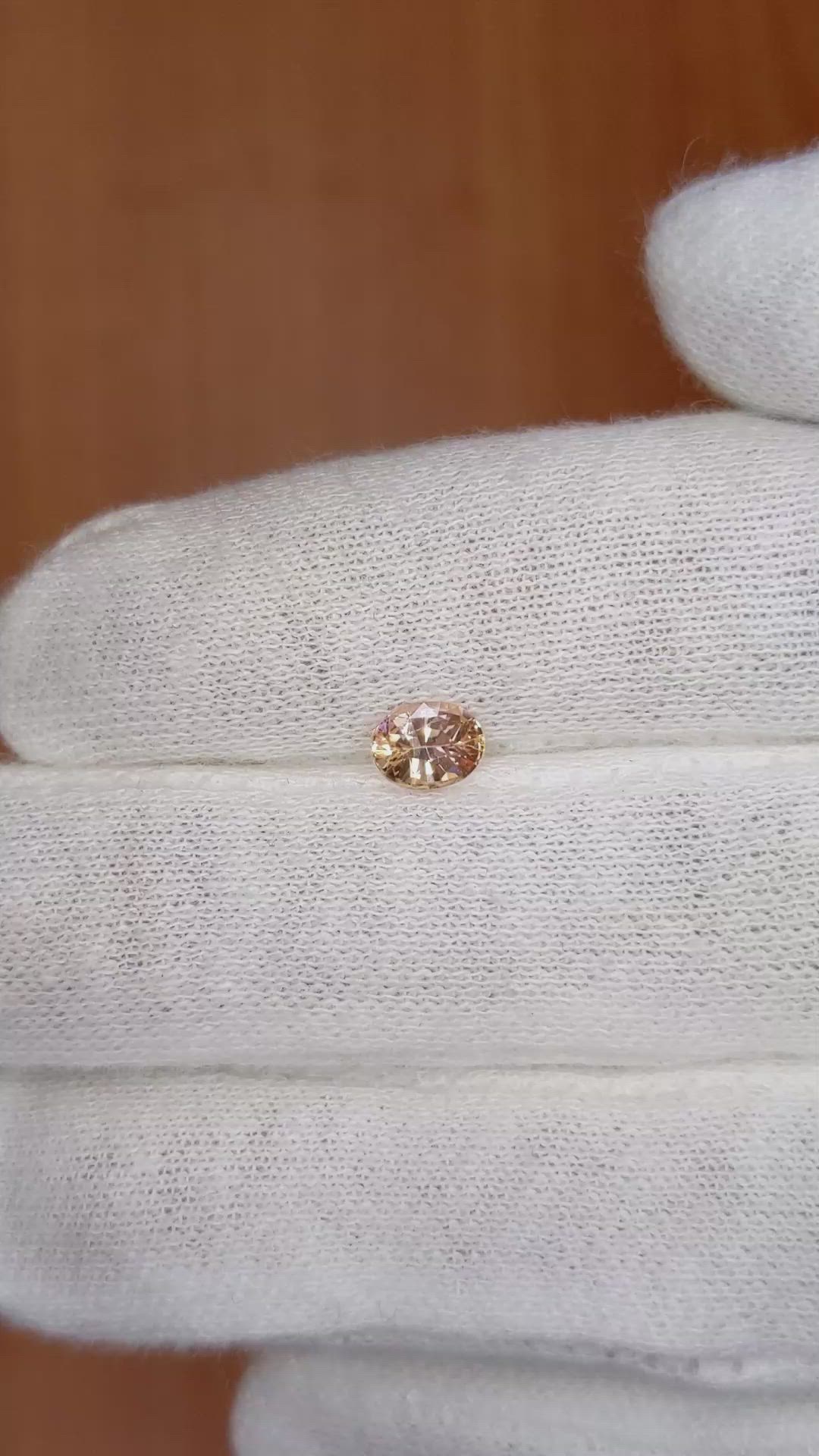 0.66 Ct. Peach Sapphire from Ceylon (Sri Lanka) Size Video